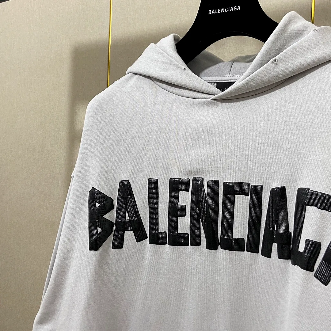 🅿️310 7110# Real photos Top version [BALENCIA*GA] Official website quality Paris new tape series hooded sweatshirt OS version Loose dropped shoulders Uniform style for men and women Fabric: 480g 100% cotton terry sweater Technology: Front and back printing Garment wash Worn Distressed Fixed color Color: black blue off-white Size: XS S M L