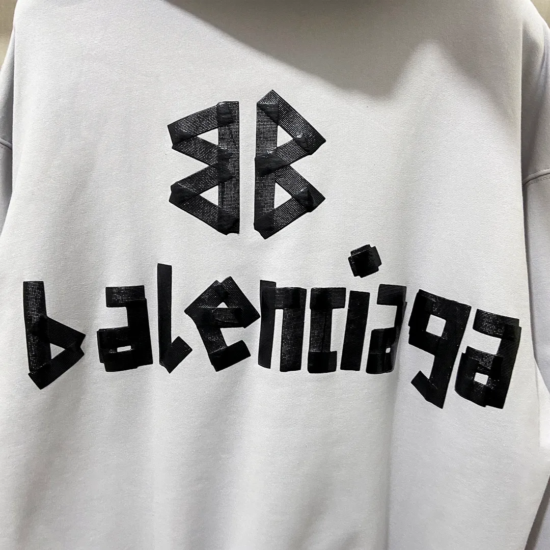 🅿️310 7110# Real photos Top version [BALENCIA*GA] Official website quality Paris new tape series hooded sweatshirt OS version Loose dropped shoulders Uniform style for men and women Fabric: 480g 100% cotton terry sweater Technology: Front and back printing Garment wash Worn Distressed Fixed color Color: black blue off-white Size: XS S M L