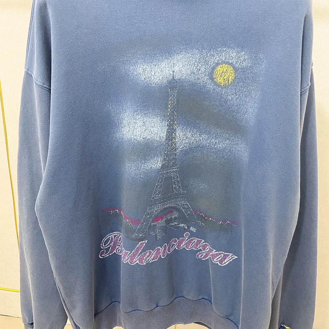 🅿️340 real photos Top version [BALENCIA*GA] Official website quality Paris' new Paris Eiffel Tower series hooded sweatshirt OS version Loose dropped shoulders Unisex style Fabric: 480g 100% cotton terry David sweater Technology: Front white ink direct spray Garment wash Frayed Distressed Fixed color Color: Washed blue Pink Size: XS S M L