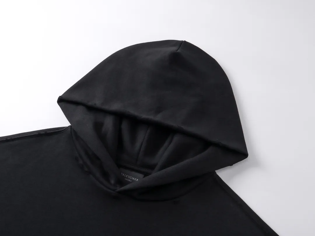 🅿️340 real photos [Top version. Official website quality] BALENCI*GA/Paris. 2024 latest front 3B mud hand-painted washed and distressed hooded sweatshirt. Brick cabinet synchronization. ⚠️Difference market currency. YB development. Worn. Hand-painted consistent with ZP. The fabric is made of Paris ZP custom-woven and dyed cotton terry sweatshirt. The weight is 460 grams, the cloth surface is clean. The cloth pattern is clear, soft and comfortable. The threads are dyed with no color difference. Ready-made garments are hand-painted, spray-painted, worn, distressed, and extra heavy-duty. Comparisons welcome. The version adopts OS loose shoulder design. Same style for men and women. Code: BL238913 Color: black blue Size: XS. S. M. L