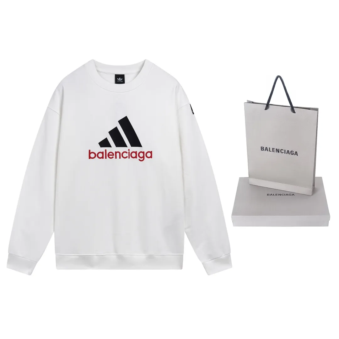 🅿️260 Detailed Picture [Top version. Official website quality] BALENCI*GA/Paris co-branded Adidas round neck sweatshirt with classic LOGO combination embroidery on the front. The fabric of the brick cabinet synchronization is made of Paris ZP custom-woven and dyed cotton sweatshirt, with a weight of 450 grams. The cloth surface is clean. The cloth pattern is clear, soft and comfortable. It has good color fastness and is not easy to change color. The threads are dyed with no color difference. The classic letter LOGO embroidery is embroidered using imported Tajima embroidery machine. The lines are clear and the effect is three-dimensional. Restored brick cabinets. The version adopts OS loose shoulder design. Same style for men and women. Code: BL235569 Color: white, black Size: XS S M L
