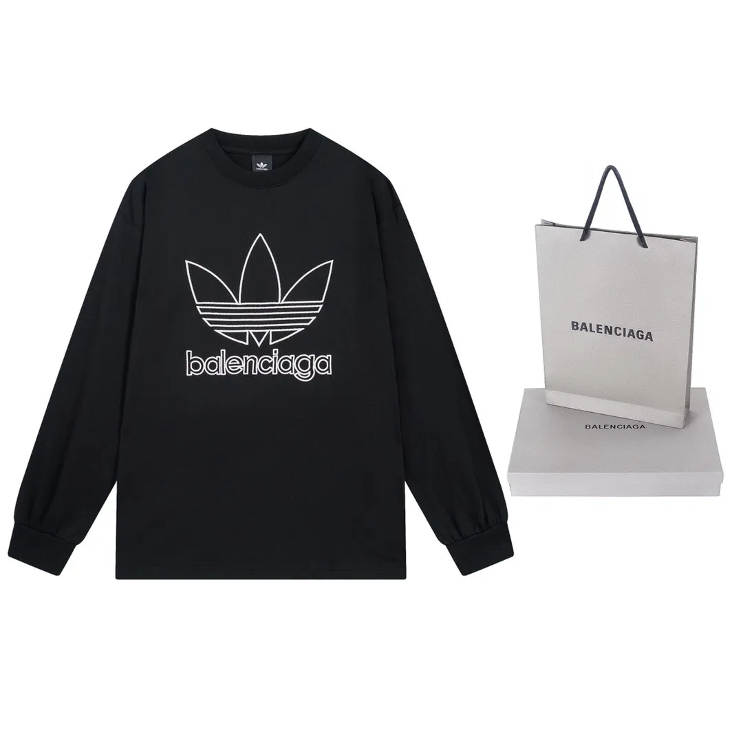 🅿️210 Detailed picture [Top version. Official website quality] BALENCI*GA/Paris co-branded Adidas front embroidered LOGO long-sleeved T-shirt# The fabric is made of Paris ZP custom-woven and dyed cotton double yarn. Weighing 260 grams, the cloth surface is clean. The cloth pattern is clear, soft and comfortable. The color fastness is good. It is not easy to change color. The threads are dyed with no color difference. The LOGO pattern letters are embroidered using imported embroidery machines, and the letters are three-dimensional and full. It is produced in Jubie market based on pictures, and comparisons are welcome. Restored brick cabinets. The version adopts OS loose shoulder design. Same style for men and women. Code: BL225028 Color: Black Size: XS S M L