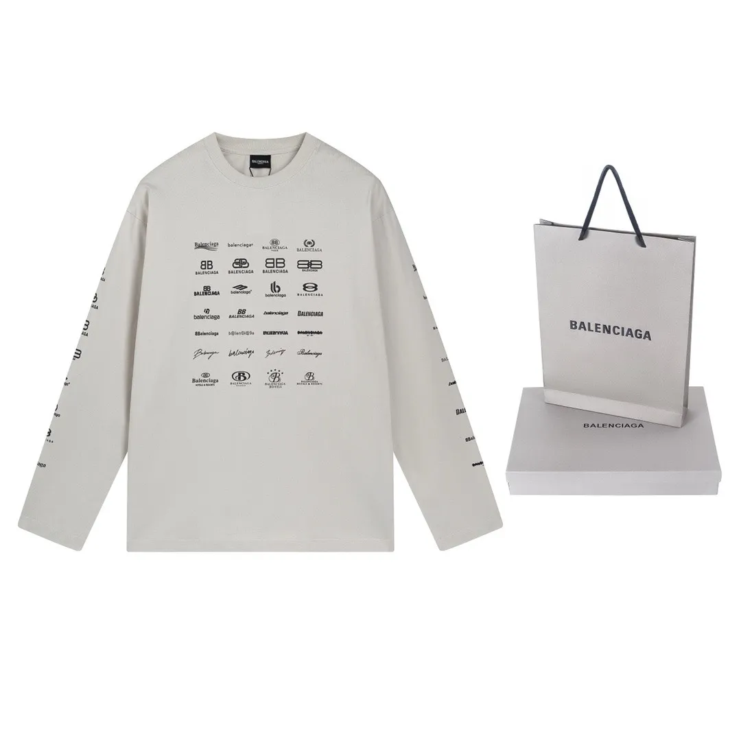🅿️200 real photos [Top version. Official website quality] BALENCI*GA/Paris BALENCI*GA# 2024 spring and summer new style, printed with classic LOGO collection long-sleeved T-shirt. 2024 spring and summer new product. Brick cabinet synchronization. Welcome to compare. The fabric is made of Paris ZP custom-woven and dyed 100% cotton double yarn compact cotton. The weight is 260 grams, the cloth surface is clean, the cloth texture is clear, soft and comfortable. The color fastness is good. It is not easy to change color. The threads are woven and dyed with no color difference. The printing uses imported environmentally friendly rubber paddles, precision stencils, fine LOGO letters, clear letters, no burrs, and a three-dimensional effect. Restore brick cabinet. The version adopts OS loose shoulder style. Same style for men and women. Code: BL225005 Color: black, beige, pink, smoky gray, white Size: XS S M L