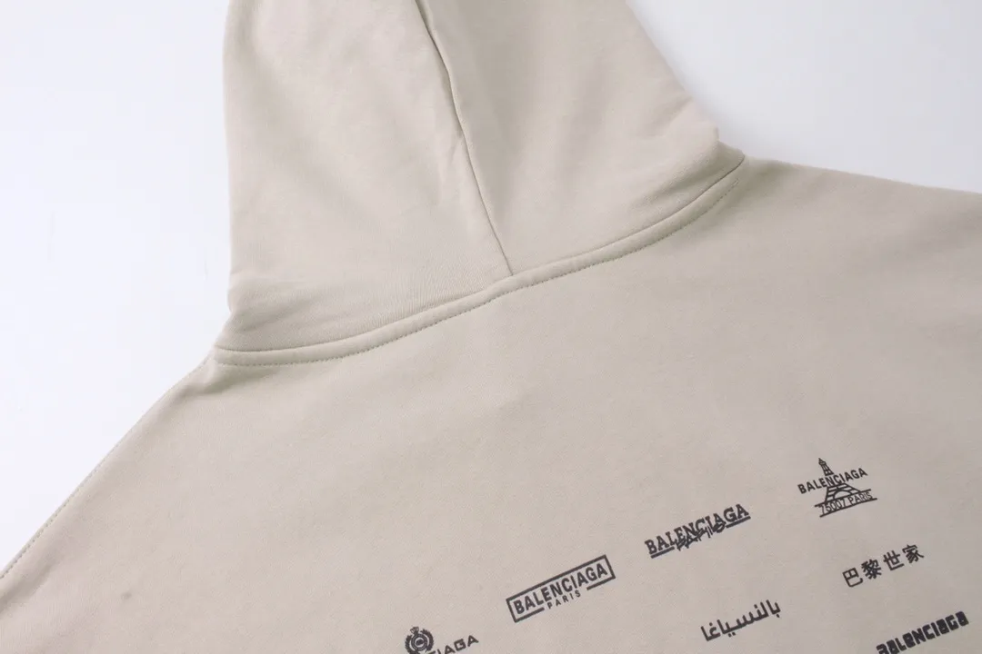 🅿️300 Detailed picture [Top version. Official website quality] BALENCI*GA/Paris BALENCI*GA#2023 spring and summer new style, long-sleeved sweatshirt with classic LOGO printed all over it. 2023 autumn and winter new product. Brick cabinet synchronization. The fabric is made of Paris ZP custom-woven and dyed cotton double yarn sweatshirt. The weight is 450 grams, the cloth surface is clean. The cloth texture is clear. Soft and comfortable. Good color fastness. Not easy to change color. The threads are woven and dyed with no color difference. The printing uses imported environmentally friendly rubber paddles, precision stencils, fine LOGO letters, clear letters, no burrs, and a three-dimensional effect. Restore brick cabinet. The version adopts OS loose shoulder style. Same style for men and women. Code: BL238002 Color: black, beige, pink, smoke gray. Size: XS S M L