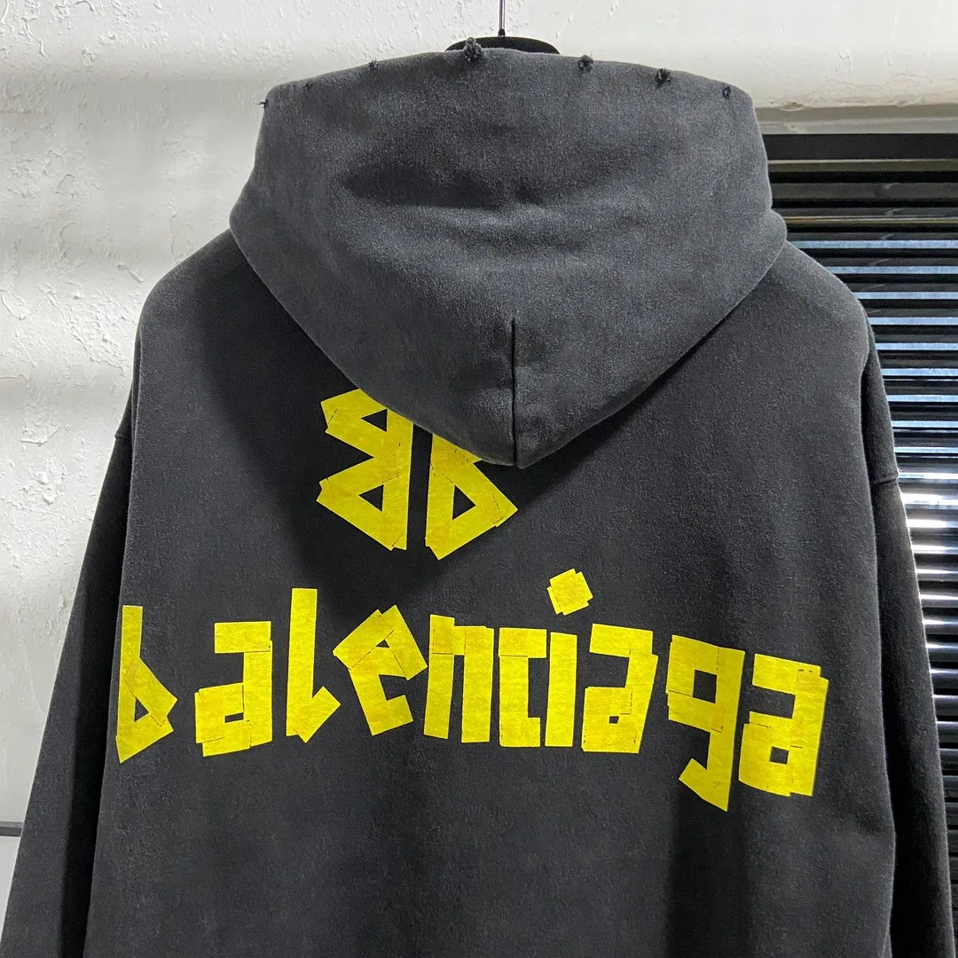 🅿️330 7153# Actual pictures Top version [BALENCIA*GA] Official website quality Paris's new yellow tape series hooded sweatshirt OS version Loose dropped shoulders Unisex style Fabric: 480g 100% cotton terry sweatshirt Technology: Front and back digital direct printing Garment wash Worn Old Shape Solid color Color: Washed black Gray blue Washed blue Size: XS S M L