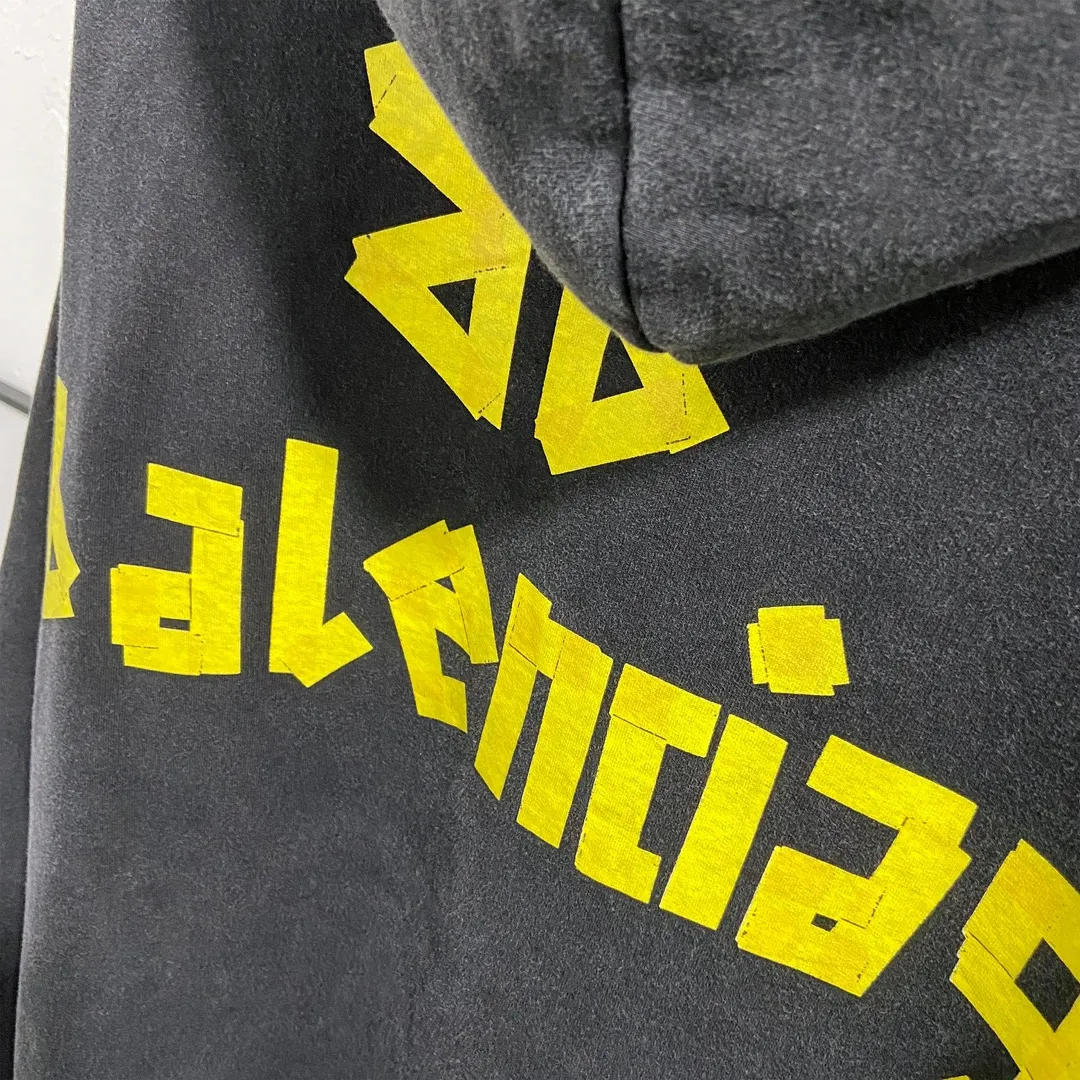 🅿️330 7153# Actual pictures Top version [BALENCIA*GA] Official website quality Paris's new yellow tape series hooded sweatshirt OS version Loose dropped shoulders Unisex style Fabric: 480g 100% cotton terry sweatshirt Technology: Front and back digital direct printing Garment wash Worn Old Shape Solid color Color: Washed black Gray blue Washed blue Size: XS S M L