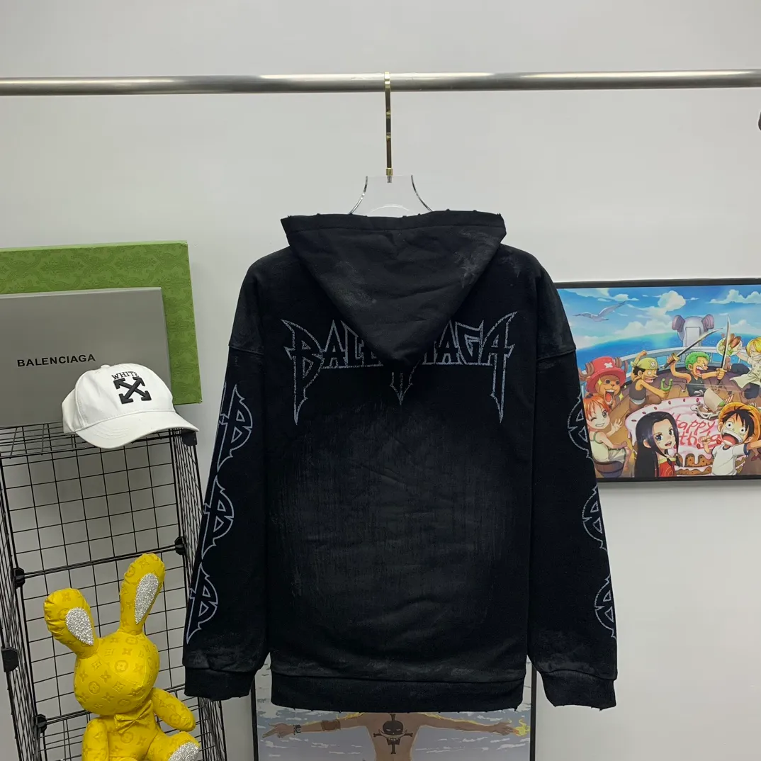 Top tested version BALENCIAGA Tower Paris Night Balenciaga distressed, dirty, hole-washed hooded sweatshirt YB1.3W purchase ➕ price 10K purchase original directional development! 460g double-ply double-yarn terry fabric, the garment weight is as high as 1.2kg! The back printing adopts Kornit digital direct printing process, and the shipment is extremely slow! Especially the Yunmu color on the tower is very delicate and grainy! The overall bursting letters are very evenly distressed and have a full sense of distress! The whole body was severely damaged, all randomly worn by hand! Very time consuming! The whole piece of clothing went through three washes. The fabric was first pre-shrunk, and then washed with distressing water to wash out the color on the printed surface to give it a distressed look. After washing with water for the second time, do the dirty coating. The staining is also a manual process, and each position of the coating must be brushed more than 3 times before! The key point is the coating on the back. It is a process that really makes people vomit blood. It has to be brushed back and forth, more than 20 times, to evenly apply the coating! It can be said that it will never be seen alive. After the coating is completed, the garments will be sprayed and then washed with wax! After washing with the wax, the fabric feels smooth and won't have that harsh, rough feel! This is also a key craft! If this step is missing, it won’t be visible on the screen, but it will be very uncomfortable and the skin texture will be very poor!  The workmanship is troublesome, and it normally takes 15 days for orders to be returned! Look at this construction period and this price, do you think it’s worth it?  Size: XS-L Color: Active Black P:470