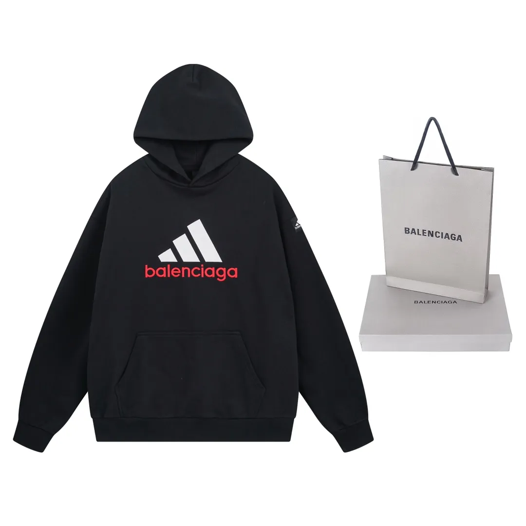 🅿️330 Detailed picture [Top version. Official website quality] BALENCI*GA/Paris co-branded Adidas classic LOGO combination on the front, embroidered hooded sweatshirt. The fabric is made of Paris ZP custom-woven and dyed cotton double yarn. Weighing 450 grams, the cloth surface is clean. The cloth pattern is clear, soft and comfortable. The color fastness is good. It is not easy to change color. The threads are dyed with no color difference. The classic letter LOGO embroidery is embroidered using imported Tajima embroidery machine. The lines are clear and the effect is three-dimensional. Restored brick cabinets. The version adopts OS loose shoulder design. Same style for men and women. Code: BL238096 Color: Black Size: XS S M L