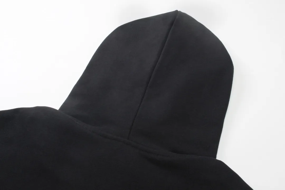🅿️400 detailed picture [Top version. Official website quality] BALENCI*GA/Paris. 2024 latest global limited edition. BALENCIAGA joins forces with Archive to create a hooded sweatshirt. Crack printing is washed and worn, over-heavy craftsmanship, and brick cabinets are synchronized. ⚠️Distinguish the market currency, genuine development, worn. The hand-painted is consistent with ZP, and the printing uses imported cracking environmentally friendly glue. The garments are washed, worn and worn. The whole piece is designed with heavy craftsmanship. Comparisons welcome. The version adopts OS loose shoulder design. Same style for men and women. Code: BL238808 Color: black, gray and white. Size: XS S M L