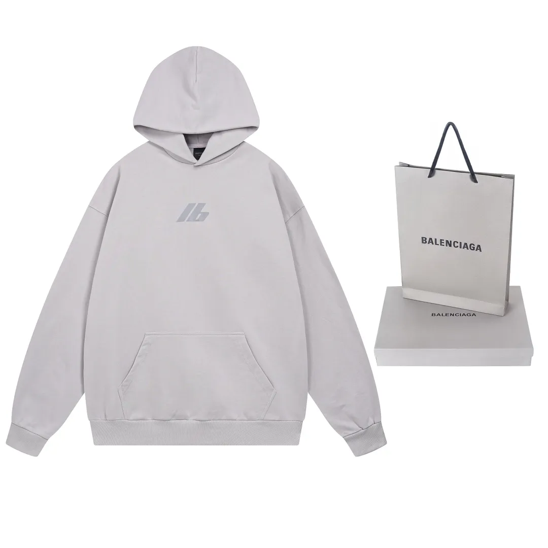 🅿️300 real photos [Top version. Official website quality] BALENCI*GA/Paris. 2024 new style. Hooded sweatshirt with front and rear LOGO reflective letters, brick cabinet synchronization. Developed as genuine product at the first time, welcome to compare! The fabric is made of Paris ZP custom-woven and dyed cotton terry sweatshirt. Weighing 460 grams, the cloth surface is clean. The cloth pattern is clear, soft and comfortable. The threads are dyed with no color difference. Get reflective film beforehand. The effect will be three-dimensional. Restore the brick cabinet. Different market currency, welcome to compare, the version adopts OS loose shoulder version. Same style for men and women Coding: BL238929 Color: black, off-white Size: XS S M L
