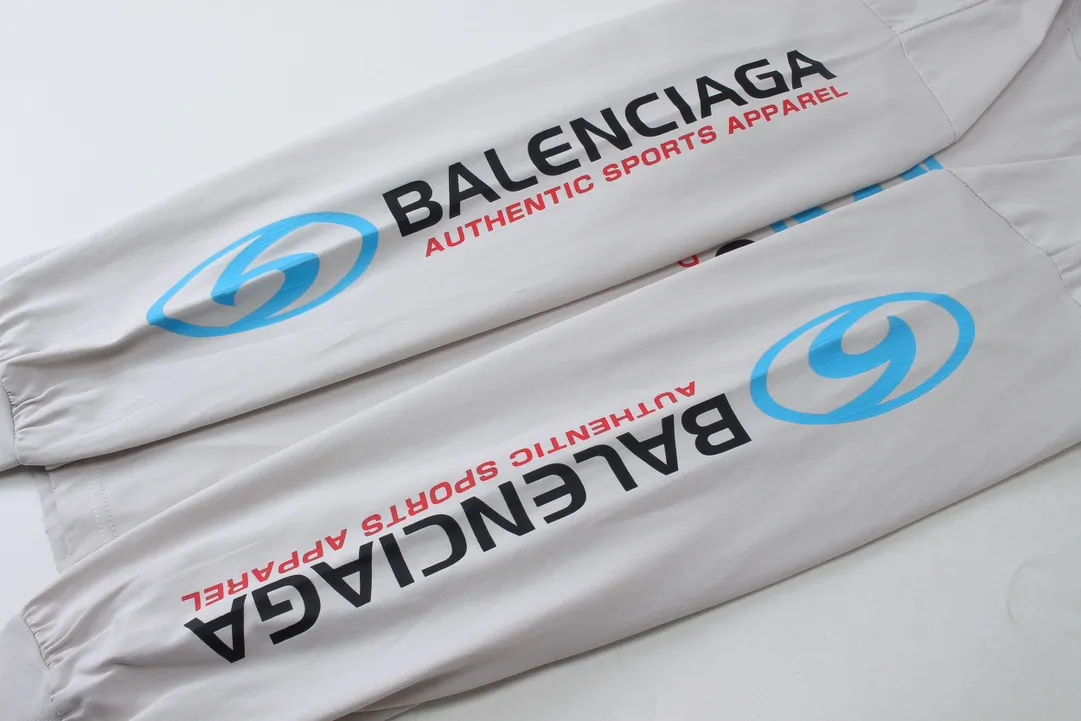 🅿️250 BALENCI*GA Paris surfing pattern long sleeves with letters. The fabric is made of Paris custom-woven double yarn cotton fabric. The weight is 280g. The thread is custom-woven and dyed without color difference. The front and back panels are made of environmentally friendly dot offset printing. Two high-temperature setting washes. os dropped shoulders and loose version. Same style for men and women -Color: gray blue beige -SIZE: XS S M L Style No. 8611#