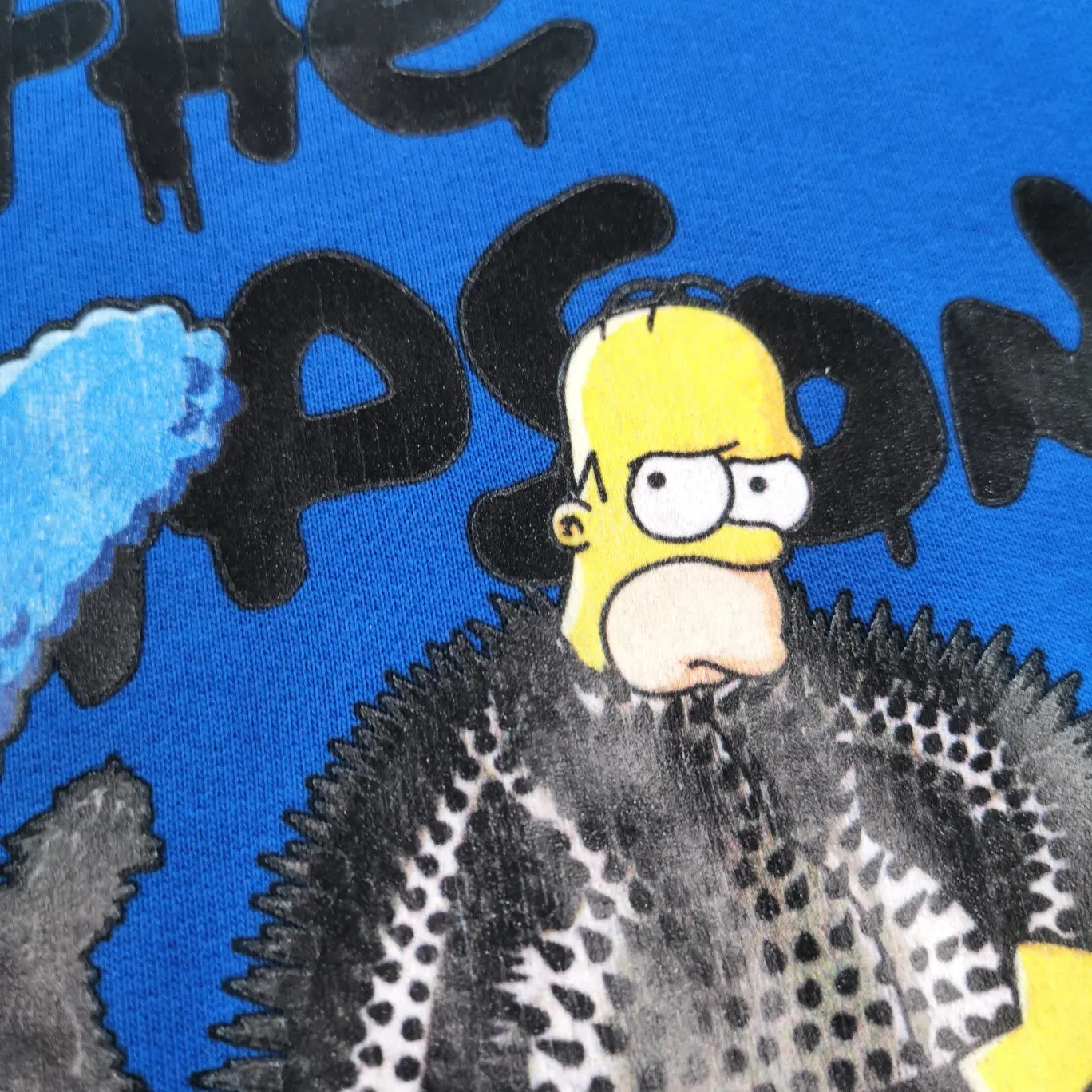 Additional details - Spring and Autumn top-notch proven version of Balenciaga BALENCIAGA The Simpsons cartoon pattern burst pattern pure cotton loose loose hooded sweatshirt for men and women couples. The process uses Kangli printing cracking effect. The front panel printing glue bursting effect uses imported transparent slurry to scrape the bottom to make the printing bursting feel uniform. (PS: If this process is missing, the printing will easily fall off in large areas after cracking.) The embroidery at the hem uses a Tajima embroidery machine imported from Japan, which makes the size and spacing of the letters even, and the hollows of the letters will not be filled. Precise craftsmanship, full of details. The fabric is made of 520g crystal composite fleece cotton, brand new, washed, and labeled. Genuine products are consistent and synchronized, and coded authentic products are consistent and synchronized. Top tested version, accurate and flawless.  Color: White Blue Black Size: XS-L P:520