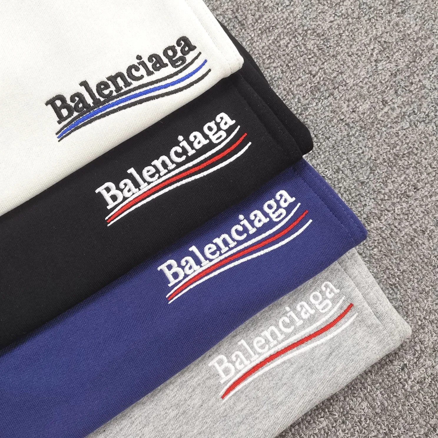 Balenciaga 21SS BLCG Balenciaga Wave Cola Shorts, a classic and versatile style is here! With these pants, they look perfect no matter what outfit you wear! Get it now! Customized special fabrics, ready-to-wear washable, soft and comfortable to the touch.  360 grams of dust-free sweatshirt fabric, washed and cut. Imported environmentally friendly water glue is added to the garment and washed twice to ensure consistent printing. Customized wash mark. This year's sincere shorts LOGO adopts Japanese Tajima embroidery technology, and the printing is full and meticulous. Color: Black/Grey/White/Blue Size: XS-L P:300