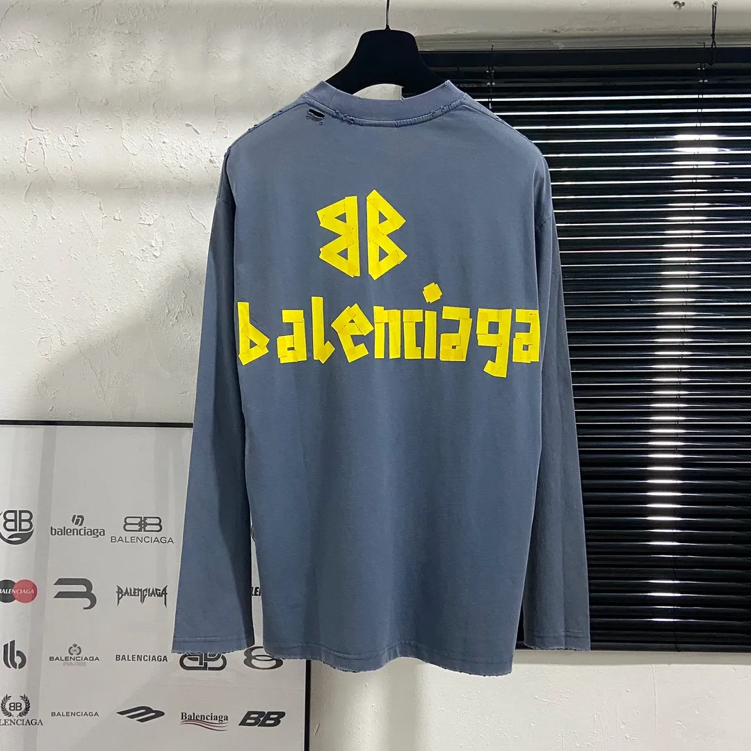🅿️200 8110# Actual pictures Top version [[BALENCIA*GA] Official website quality Paris new yellow tape digital direct spray long-sleeved T-shirt OS version Loose dropped shoulders Unisex style Fabric: 260g 100% cotton double yarn Process: Front and back digital direct spray Garment wash Frayed Distressed Styling Solid Color Color: Gray blue Black White Washed blue Burgundy Green Size: XS S M L