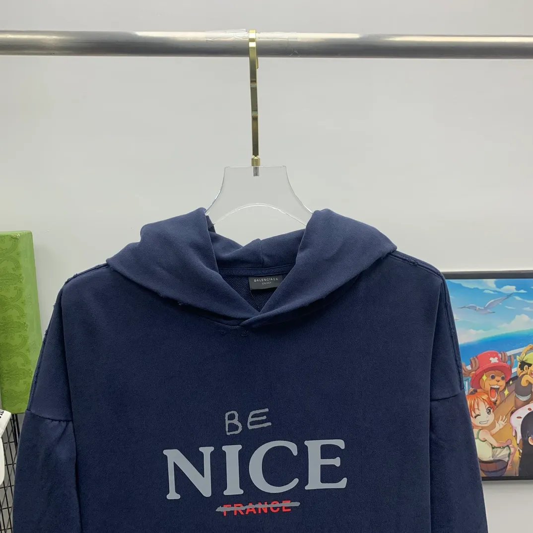 The top tested version weighs 520 grams 23FW Balenciaga BALENCIAGA NICE letters are aged and washed, loose and heavy, breaking the same style of male and female couple celebrities' pure cotton hooded sweatshirts. It will definitely attract attention when going out with couples style! Fashionable, relaxed and stylish, the atmosphere is instantly full! NICE printed letters have a very good meaning! The whole body adopts multiple destruction techniques, and it will definitely follow the pattern! Live broadcast artifact! The correct version has custom-woven embroidered auxiliary labels on the cuffs, which are double-sided. BALENCIAGA LOGO shows high-end temperament! Made of heavyweight 520g pure cotton fabric, 100% identical to the original! Custom woven and dyed, soft and comfortable, delicate and waxy to the touch, very comfortable on the upper body! The simple and fashionable round neck design is simple and extraordinary, and it is very eye-catching. The stitching is very smooth and delicate, with a certain degree of looseness. It is strong, stylish, washable, durable and will not deform easily after long-term wear!  Size: XS-L Color: Dark Blue Apricot P:390