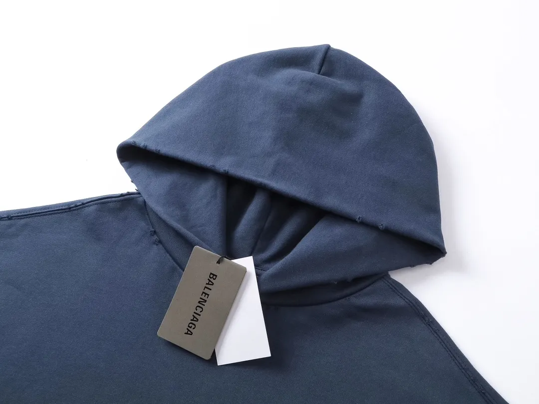 🅿️356 Detailed Pictures [Top version. Official website quality] BALENCI*GA/Paris. 2023 latest mud hand-painted frayed washed and distressed long-sleeved hooded sweatshirt. The brick cabinets are synchronized. ⚠️ Differentiate the market currency. Developed by YB. The color is black and blue. Worn. The hand-painted is consistent with ZP, ‼ ️The fabric is made of Paris ZP custom-woven and dyed cotton sweatshirt. The weight is 450 grams. The cloth surface is clean. The cloth pattern is clear, soft and comfortable. The threads are dyed with no color difference. Ready-made garments are hand-painted, worn, and distressed, with heavy craftsmanship. Comparisons welcome. The version adopts OS loose shoulder design. Same style for men and women. Code: BL238003 Color: black blue, off-white, blue Size: XS S M L