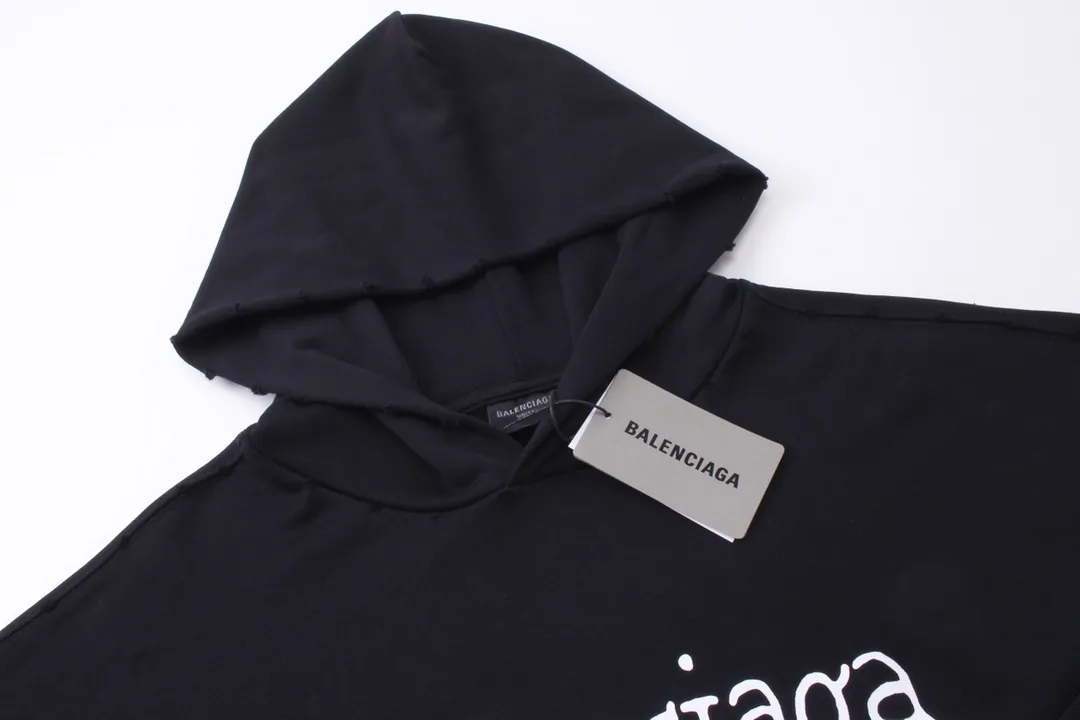 🅿️300 detailed pictures [Top version. Official website quality] BALENCI*GA/Paris #New front and rear Coke classic LOGO graffiti hooded sweatshirt #2023 autumn and winter new style. Brick cabinet synchronization.                       The fabric is made of Paris ZP custom-woven and dyed cotton sweatshirt. The weight is 450 grams. The cloth surface is clean. The cloth pattern is clear, soft and comfortable. The color fastness is good. It is not easy to change color. The printing uses a circular machine to imitate hand-painted effects. There are no burrs. The color is returned to the original board and the brick cabinet is restored. The version adopts OS loose shoulder design. Same style for men and women. Code: BL238065 Color: Black Size: XS S M L