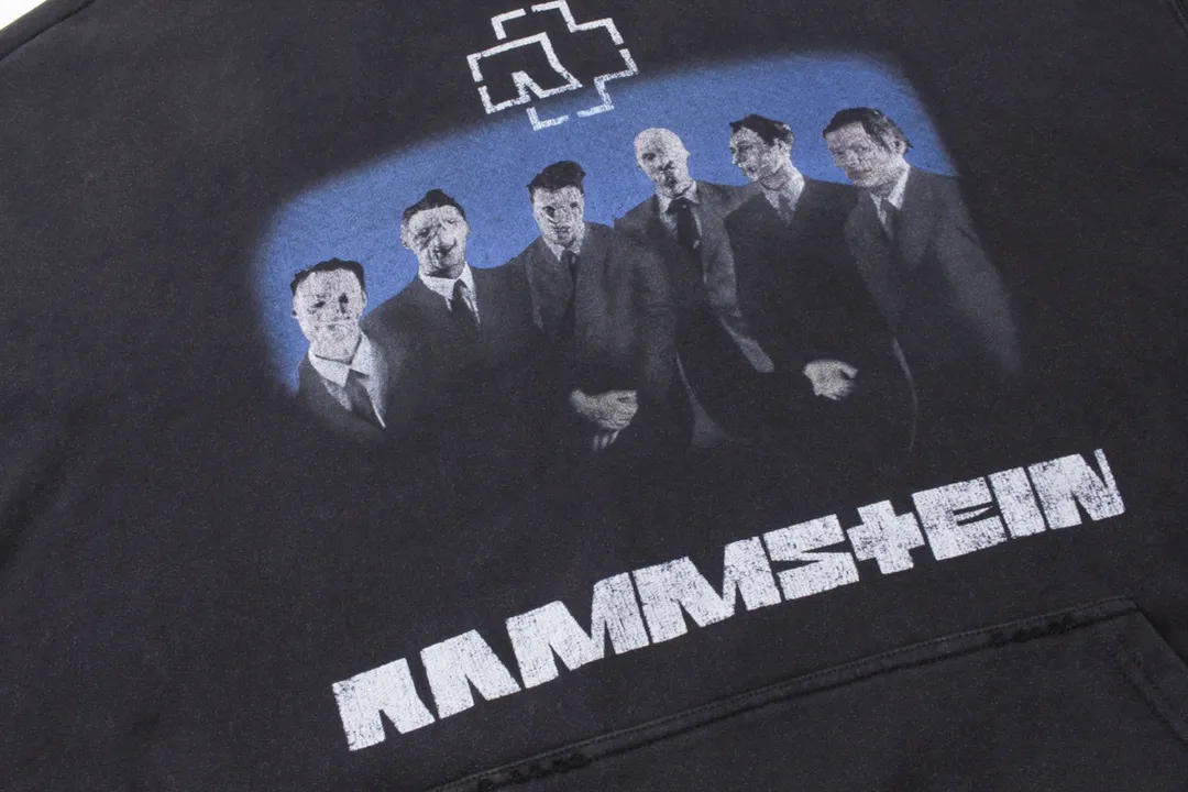 🅿️330 Detailed picture [Top version. Official website quality] BALENCI*GA/Paris Rammstein band co-branded hooded sweatshirt. The fabric is made of Paris ZP custom-woven and dyed cotton sweatshirt. The net weight is 450 grams. The cloth surface is clean. The cloth pattern is clear, soft and comfortable. The threads are dyed with no color difference. The pattern adopts Kornit digital direct printing machine, the letter strips are drawn with crack technology, the direct printing color is aligned with the original color, the LOGO is embroidered on the back of the clothes and legs, the ready-made clothes are washed and worn, the brick cabinets are restored, and the Jubie market is produced according to the pictures. You are welcome to compare the version and adopt the OS loose shoulder version. Same style for men and women Code: BL238070 Color: Washed black Size: XS S M L
