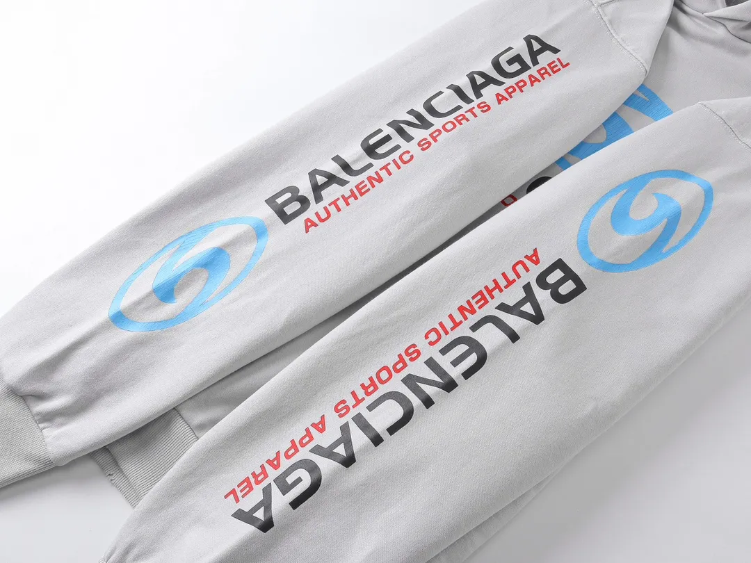 🅿️330 real photos [Top version. Official website quality] BALENCI*GA/Paris. 2024 new style. Paris surf pattern letter printing straight cracks. Ready-to-wear worn and distressed hooded sweatshirt, brick cabinet synchronization. Genuine product developed at the first time, happy to print and compare! The fabric is made of Paris ZP custom-woven and dyed cotton terry sweatshirt. Weighing 460 grams, the cloth surface is clean. The cloth pattern is clear, soft and comfortable. The threads are dyed with no color difference. The classic LOGO is printed using environmentally friendly imported materials with clear pattern letters and a three-dimensional effect. Restored brick cabinet. Ready-made garments are washed, worn and distressed. Different market currency. Welcome to compare. The version adopts OS loose shoulder style. Same style for men and women. Code: BL238931 Color: gray blue, gray white Size: XS S M L