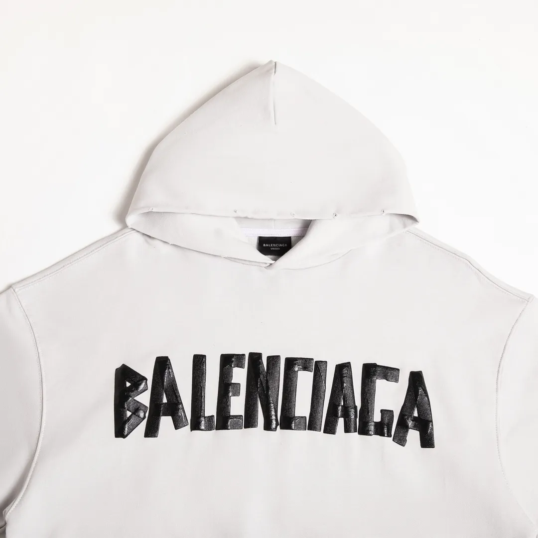 🅿️310 7110# Detailed picture Top version [BALENCIA*GA] Official website quality Paris new tape series hooded sweatshirt OS version Loose dropped shoulders Unisex style Fabric: 480g 100% cotton terry sweatshirt Process: Front and back printing Garment wash Worn Distressed Shape solid color Color: black blue off-white Size: XS S M L