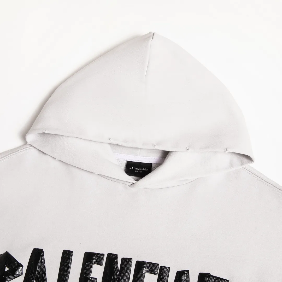 🅿️310 7110# Detailed picture Top version [BALENCIA*GA] Official website quality Paris new tape series hooded sweatshirt OS version Loose dropped shoulders Unisex style Fabric: 480g 100% cotton terry sweatshirt Process: Front and back printing Garment wash Worn Distressed Shape solid color Color: black blue off-white Size: XS S M L