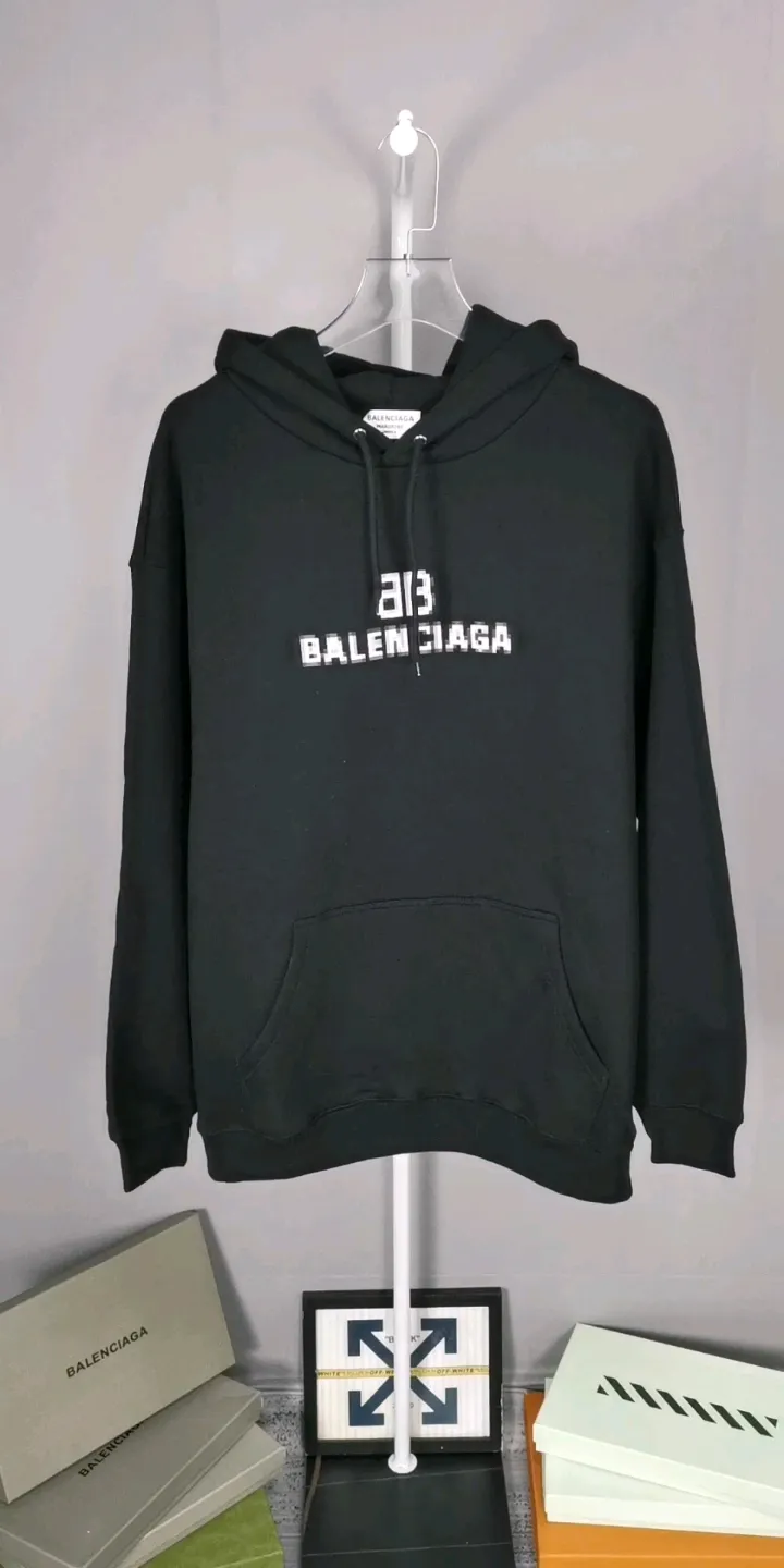 Real shot of the video - Spring and Autumn top tested version Balenciaga 22S early spring new fashion hole phantom mosaic blurred letters loose cotton hoodie sweatshirt. The fabric is made of 520g composite crystal velvet, the fabric density is extremely high, the chest is printed with digital direct injection, the fuzzy mathematical pattern dizzy effect, and the hazy gradient phantom printing of the English "Balenciaga" on the chest is restored without any difference. The intercalated gray is a yarn-dyed fabric, and the yarn is dyed first and then woven. Feel free to compare.  Color: Black White Size: XS-L P: 460