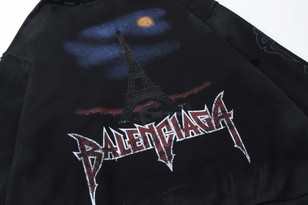 🅿️380 real shots [Top version. Official website quality] BALENCI*GA/Paris. 2024 latest Paris Eiffel Tower inkjet graffiti hand-painted gradient color print washed distressed hooded sweatshirt. Overweight craftsmanship, brick cabinet synchronization. ⚠️Distinguish the market currency, genuine development, this style is black enzyme wash. It is not the market wrong wash water black. The weight is 450 grams, worn. The hand-painted is consistent with ZP, and the printing uses Kornit digital direct printing. The garments are washed, worn and worn. Graffiti are hand-painted. The whole piece is designed with extra heavy craftsmanship. Comparisons welcome. The version adopts OS loose shoulder design. Same style for men and women. Code: BL238012 Color: Black Size: XS S M L