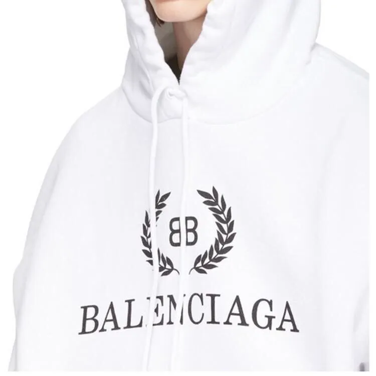 ♻️💯Reference model picture for the upper body❤️The top tested version of Balenciaga's classic wheat ear hooded sweatshirt. It is made of 480g pure cotton double yarn terry fabric, which is thick and textured. It is made of high-density knitted fabric technology. It is firm and elastic, with high suppleness and skin-friendliness. It feels soft and delicate, does not shrink or deform, and the upper body is crisp and stylish. It is different from the cheap soft couch fabrics with low weight and low count on the market.  Ultra-high-level workmanship, every detail shows a sense of luxury, and the original three-dimensional cutting process creates a perfect fit. The OS loose shoulder style accommodates all body types. It is a truly versatile style that looks slim and good-looking for both men and women.  The brushed classic wheat ear letter print has high fastness and will not crack or fall off. The classic pattern will never go out of style. Multiple colors are available, and every color is beautiful!  Color: White Size: XS-L P:420