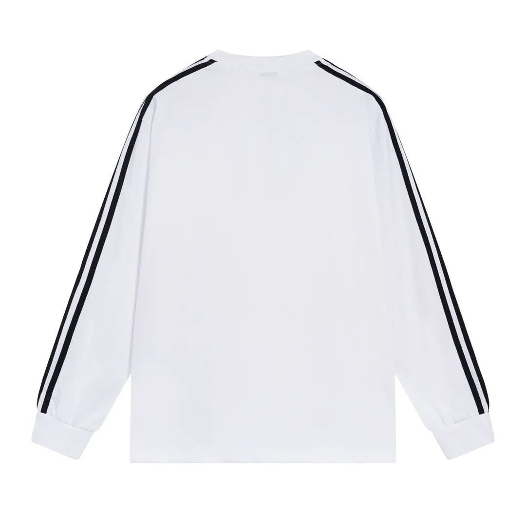 🅿️216 Actual pictures [Top version. Official website quality] BALENCI*GA/Paris co-branded Adidas Adidas clover three-stripe LOGO printed long-sleeved T-shirt #brick cabinet synchronization. Wait for a while to purchase and develop. Differentiating market currency, the fabric is made of Paris ZP custom-woven and dyed cotton double yarn. Weighing 260 grams, the cloth surface is clean. The cloth pattern is clear, soft and comfortable. The threads are dyed with no color difference. The classic pattern is printed with advanced materials, the letters are clear, three-dimensional, without burrs, and the brick cabinet is restored. Comparisons welcome. The version adopts OS loose shoulder design. Same style for men and women. Code: BL225008 Color: black, white, blue Size: XS S M L