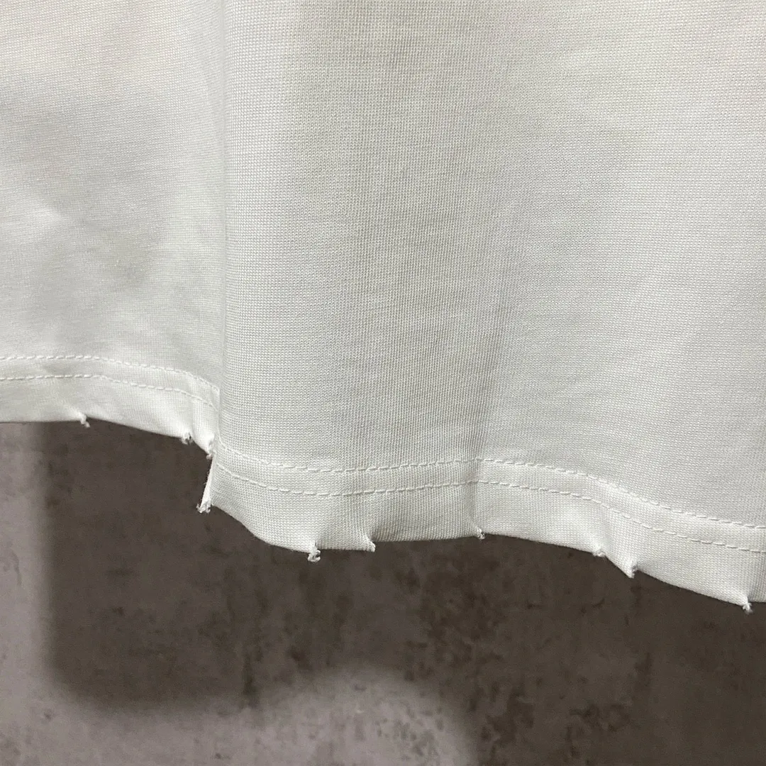 🅿️210 9139# Detailed picture Top version [[BALENCIA*GA] Official website quality Paris new hardware buckle rivet perforated short-sleeved T-shirt OS version Loose dropped shoulders Unisex style Fabric: 260 grams 100% cotton double yarn Craftsmanship: Hand-made buttoning Garment washing Frayed Old styling Solid color Color: Black White Size: XS S M L