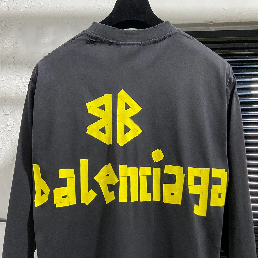 🅿️200 8110# Actual pictures Top version [[BALENCIA*GA] Official website quality Paris new yellow tape digital direct spray long-sleeved T-shirt OS version Loose dropped shoulders Unisex style Fabric: 260g 100% cotton double yarn Process: Front and back digital direct spray Garment wash Frayed Distressed Styling Solid Color Color: Gray blue Black White Washed blue Burgundy Green Size: XS S M L