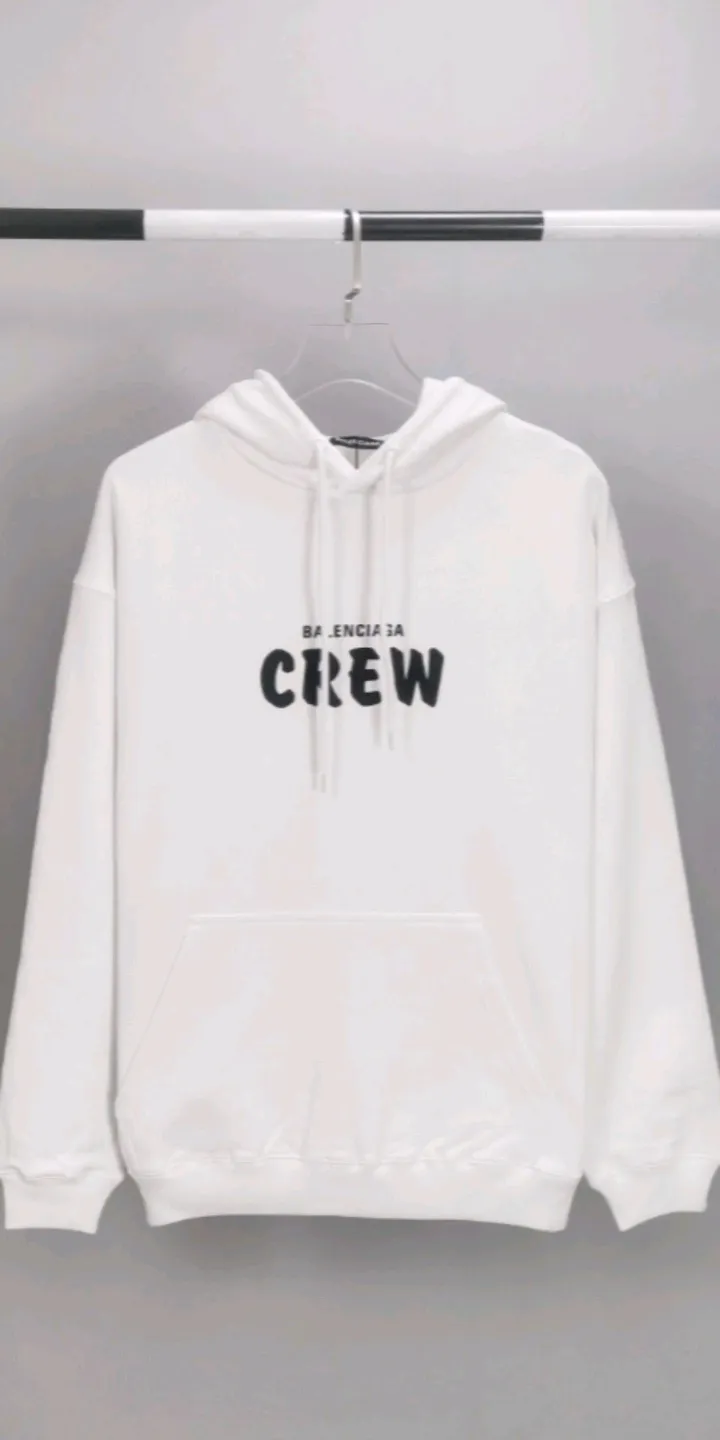 Real shot of the video - the top tested version of BALENCIAGA Balenciaga CREW employees limited to male and female couples star autumn and winter pure cotton hoodie sweatshirt hooded. As a Balenciaga 20th anniversary employee limited short-sleeve, full of Parisian feelings, highly recommended! ! The letters on the chest are also very simple and elegant, and the shape is super OS. The whole dress has been washed, and the 480g combed cotton terry fabric is very textured and you can touch it! High-definition imported glue and high-coverage screen printing on the chest, the dots are very precise. Color: Peach Pink Lemon Yellow Black White Size: XS-L P:430