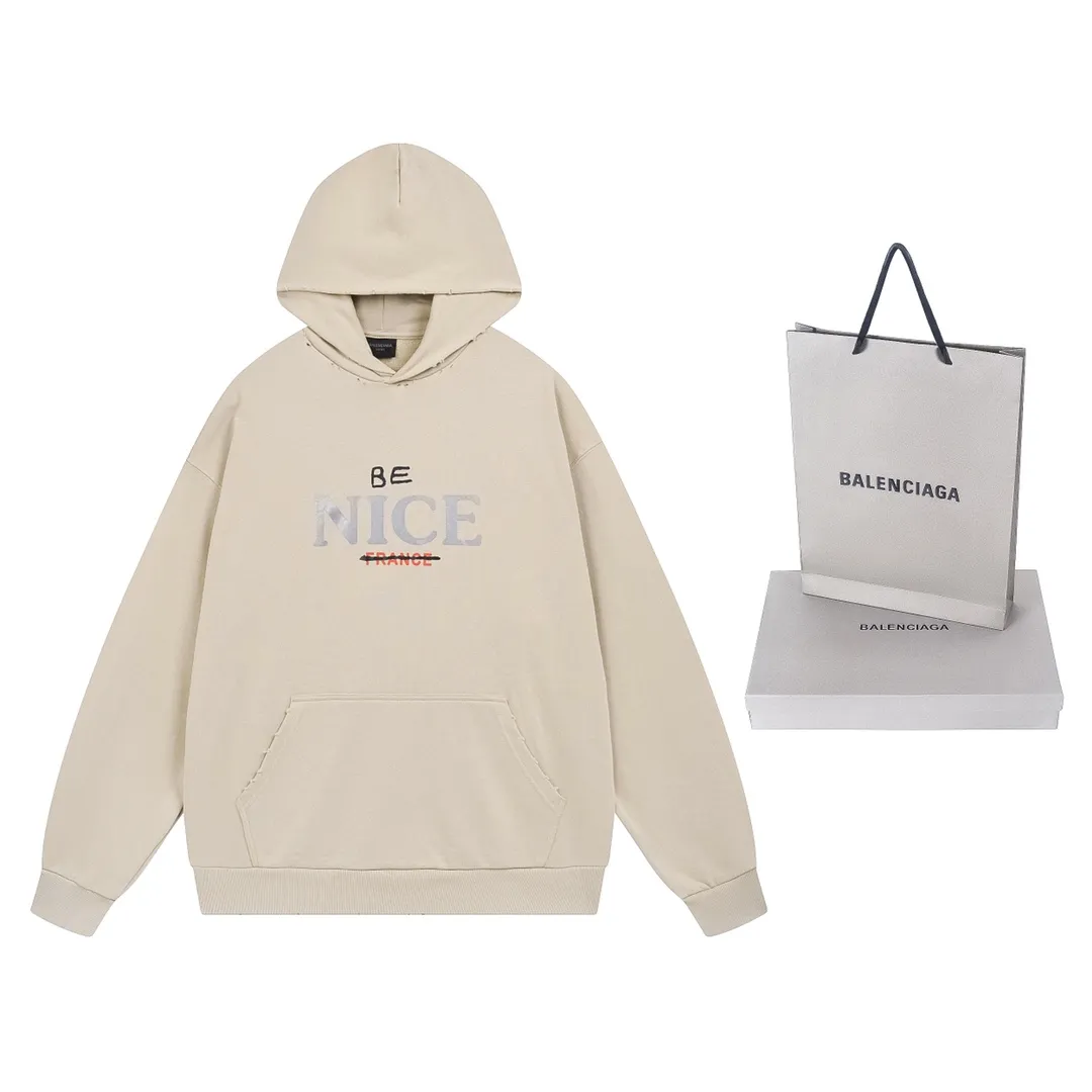 🅿️316 real photos [Top version. Official website quality] BALENCI*GA/Paris BALENCI*GA#NICE letter printed hooded sweatshirt. New product for autumn and winter 2023. Purchase the original board for the first time to customize. Color printing. Washed and worn to be consistent with the original board. Welcome to compare. Brick cabinet synchronization. The fabric is made of Paris ZP custom-woven and dyed cotton double-yarn large parka. The weight is 450 grams. The cloth surface is clean. The cloth pattern is clear. It is soft and comfortable. It has good color fastness and is not easy to change color. The threads are woven and dyed with no color difference. The printing uses a round machine hand-painted effect. No burrs. The color is the same as the original board. The whole piece of clothing is hand-made and worn. The brick cabinet is restored. The version adopts the OS loose shoulder version. Same style for men and women. Code: BL238033 Color: Gray purple. Apricot Size: XS S M L