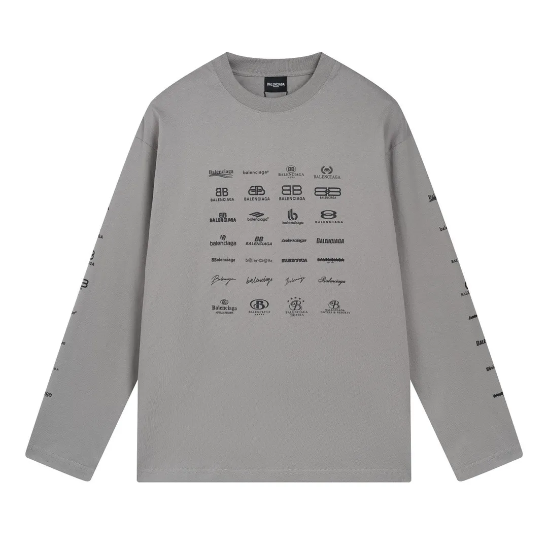 🅿️200 real photos [Top version. Official website quality] BALENCI*GA/Paris BALENCI*GA# 2024 spring and summer new style, printed with classic LOGO collection long-sleeved T-shirt. 2024 spring and summer new product. Brick cabinet synchronization. Welcome to compare. The fabric is made of Paris ZP custom-woven and dyed 100% cotton double yarn compact cotton. The weight is 260 grams, the cloth surface is clean, the cloth texture is clear, soft and comfortable. The color fastness is good. It is not easy to change color. The threads are woven and dyed with no color difference. The printing uses imported environmentally friendly rubber paddles, precision stencils, fine LOGO letters, clear letters, no burrs, and a three-dimensional effect. Restore brick cabinet. The version adopts OS loose shoulder style. Same style for men and women. Code: BL225005 Color: black, beige, pink, smoky gray, white Size: XS S M L