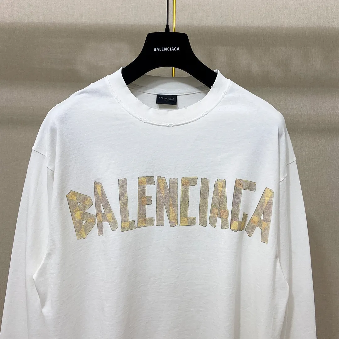 🅿️200 8110# Actual pictures Top version [[BALENCIA*GA] Official website quality Paris new yellow tape digital direct spray long-sleeved T-shirt OS version Loose dropped shoulders Unisex style Fabric: 260g 100% cotton double yarn Process: Front and back digital direct spray Garment wash Frayed Distressed Styling Solid Color Color: Gray blue Black White Washed blue Burgundy Green Size: XS S M L