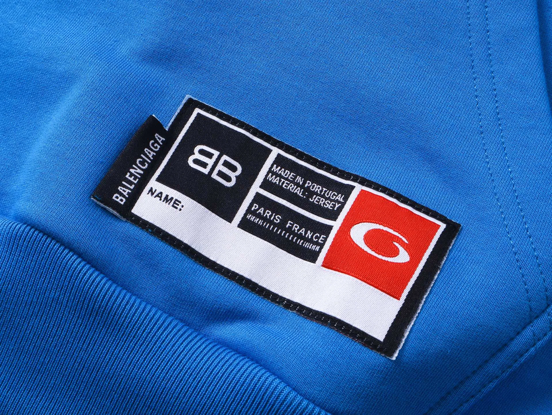 🅿️350 Actual pictures [Top version. Official website quality] BALENCI*GA/Paris.SS25 latest basketball uniform embroidered printed hooded long-sleeved sweatshirt. The front embroidery is embroidered and printed using a Tajima computer embroidery machine, the lower left corner is stamped, and the back piece is printed. The brick cabinets are synchronized. The authentic product is developed at the first time. The fabric is made of Paris ZP custom-woven and dyed cotton sweatshirt. Weighing 460 grams, the cloth surface is clean. The cloth pattern is clear, soft and comfortable. The threads are dyed with no color difference. The printing uses environmentally friendly imported materials, the letters are clear and the effect is three-dimensional. The version adopts OS loose shoulder design. Same style for men and women. Code: BL258959 Color: Black Purple Blue Green Size: XS S M L