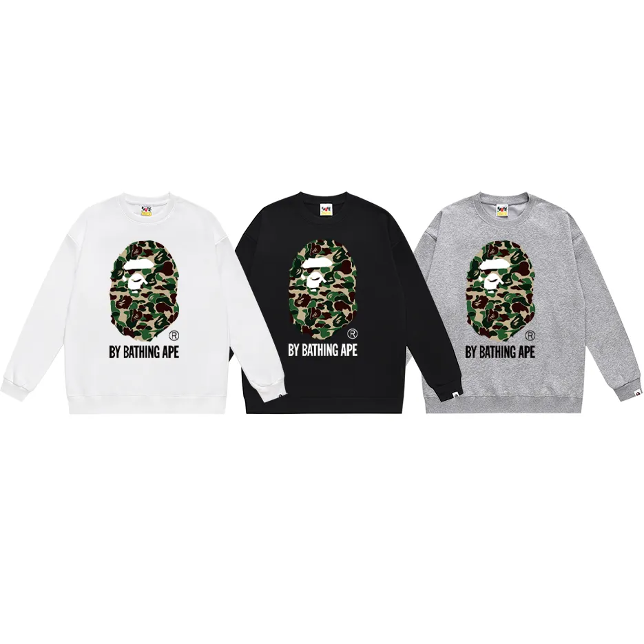 P150 model number SC451# terry 75 plus velvet 80 (top version) BAPE classic camouflage ape head letter printed round neck sweatshirt. Made of 350g large terry (drop shoulder large version) fabric, soft texture and no pilling. Imported environmentally friendly printing glue, bright and three-dimensional pattern. Quality 💥Same style for men and women. The upper body is trendy. Color: black and blue, white and blue, gray and blue, black and green, white and green, gray and green, black and red, white and red, gray and red. Size: S M L XL XXL