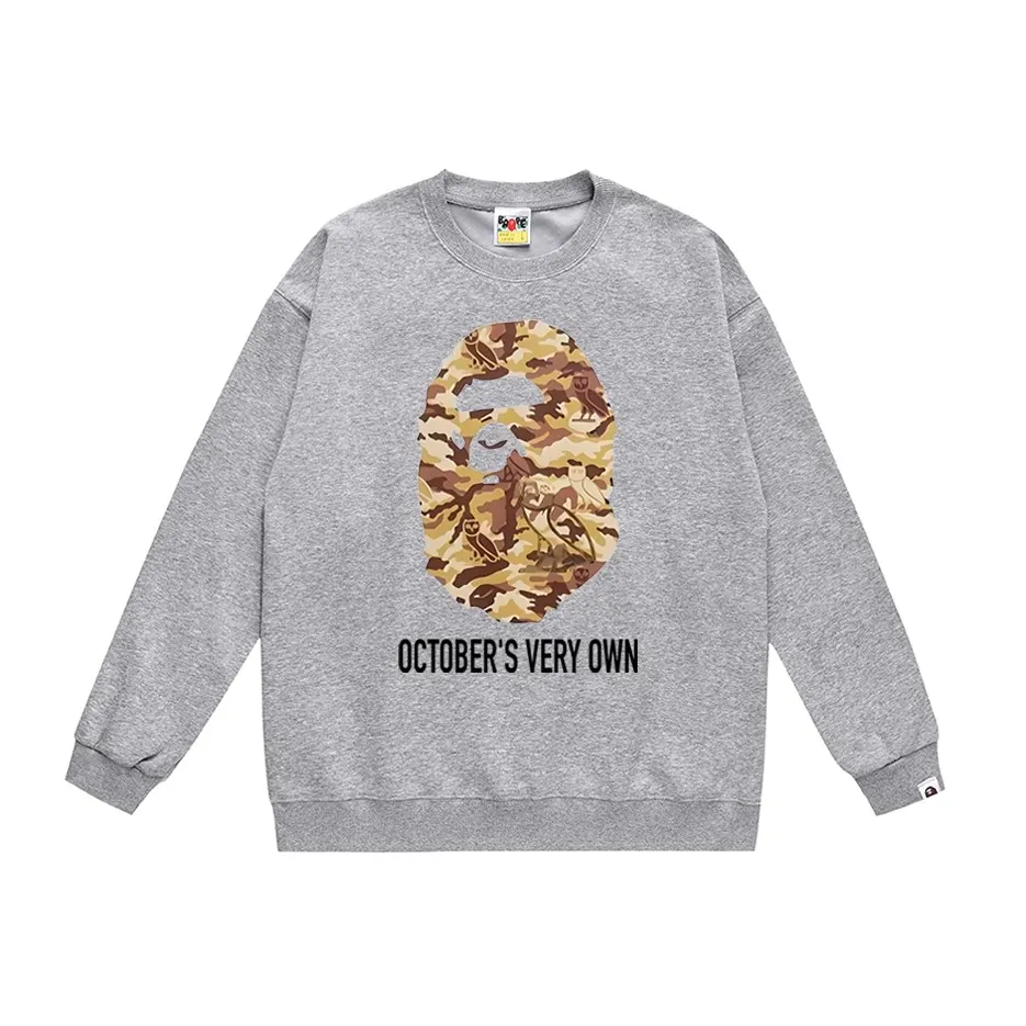 P170 model number SC316# terry 80 plus velvet 85 (top version) BAPE ape head co-branded owl camouflage printed round neck sweatshirt Made of 350 grams of large terry (drop shoulder large version) fabric, soft texture and no pilling Imported environmentally friendly printing glue The pattern is bright and three-dimensional Quality 💥Same style for men and women The upper body is trendy Color: black white gray Size: S M L XL XXL