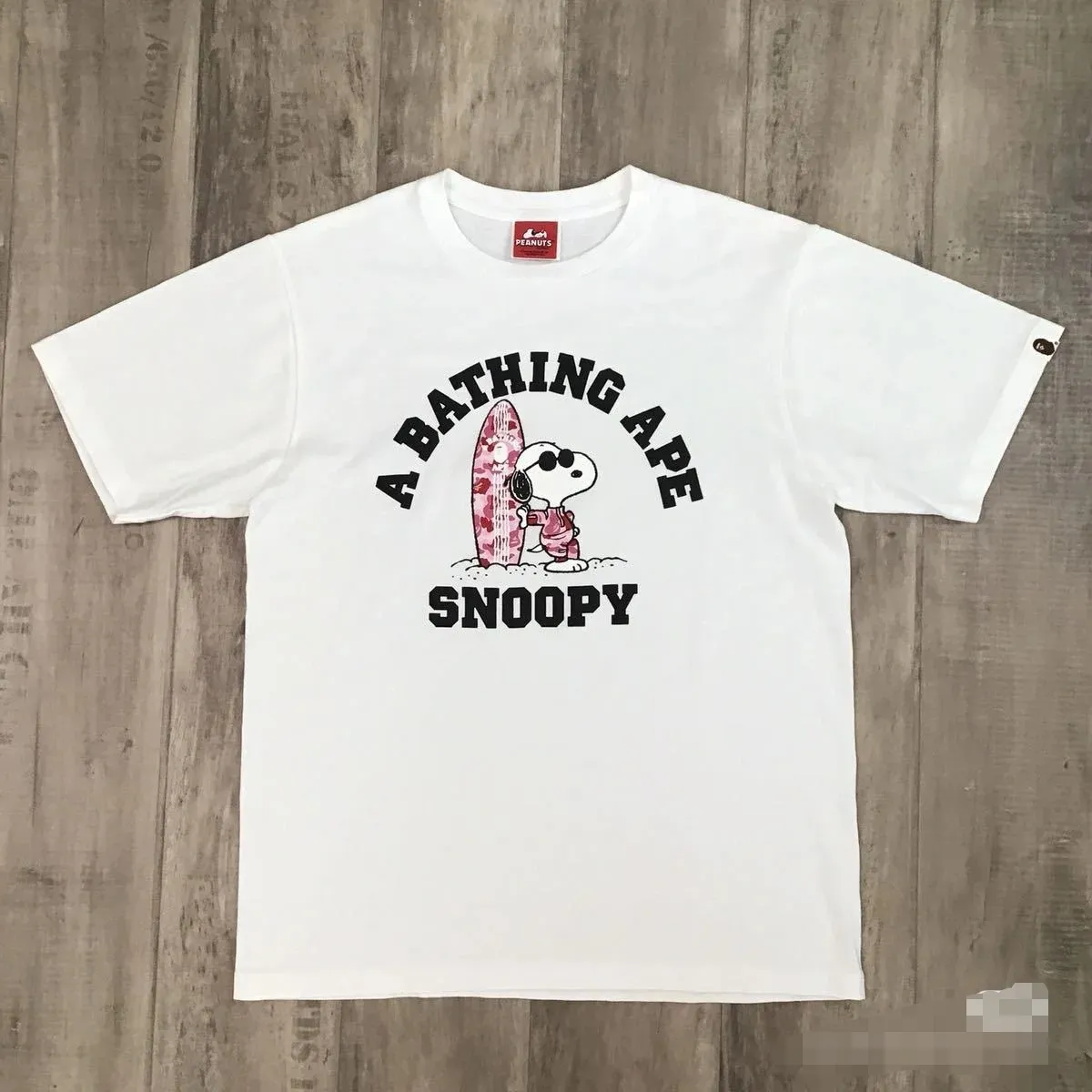 P110 001090 style | BAPE A BATHING APE × Snoopy ABC joint style printed short-sleeved T-shirt, same style for men and women, size smlxlxxl, white