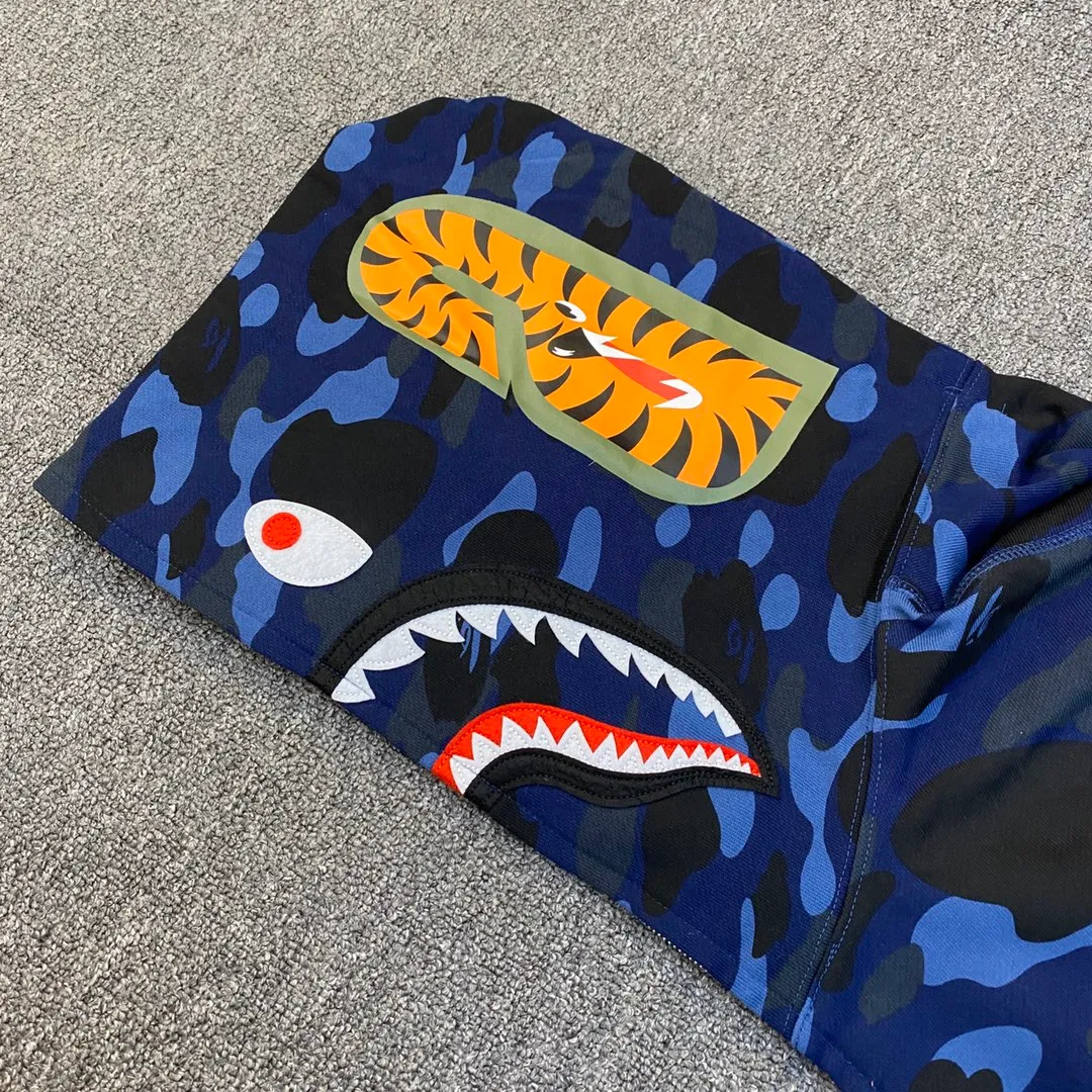 💰380 BAPE 1ST CAMO SHARK FULL Classic counter model Camouflage shark hooded zipper sweatshirt Machine-printed camouflage Top-quality fabric High-end 1:1 replica Customized fabric Couple model: S—XXL [Camouflage yellow, Camouflage green, Camouflage red, Camouflage purple, Camouflage blue, Camouflage gray]