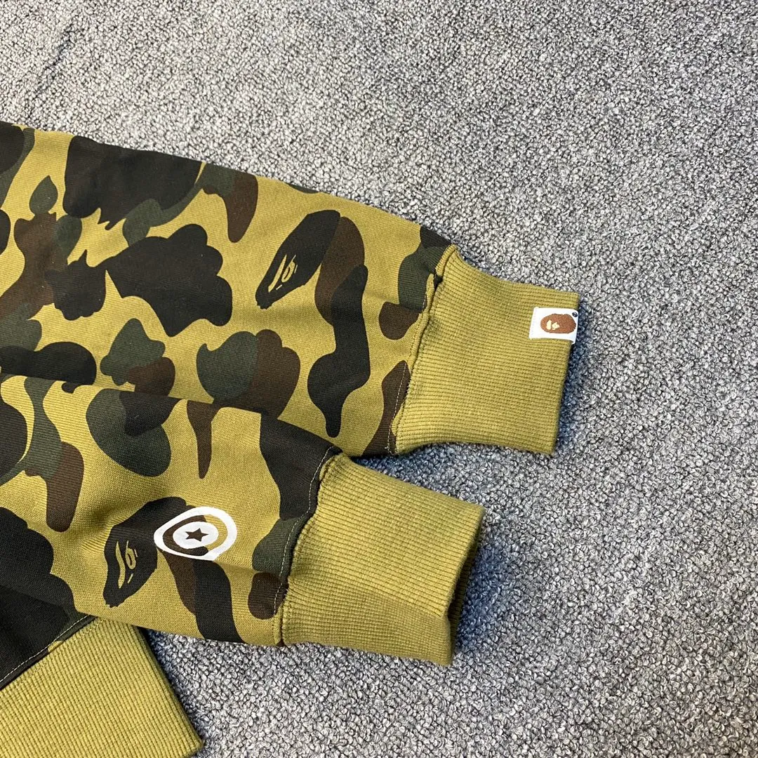 💰380 BAPE 1ST CAMO SHARK FULL Classic counter model Camouflage shark hooded zipper sweatshirt Machine-printed camouflage Top-quality fabric High-end 1:1 replica Customized fabric Couple model: S—XXL [Camouflage yellow, Camouflage green, Camouflage red, Camouflage purple, Camouflage blue, Camouflage gray]