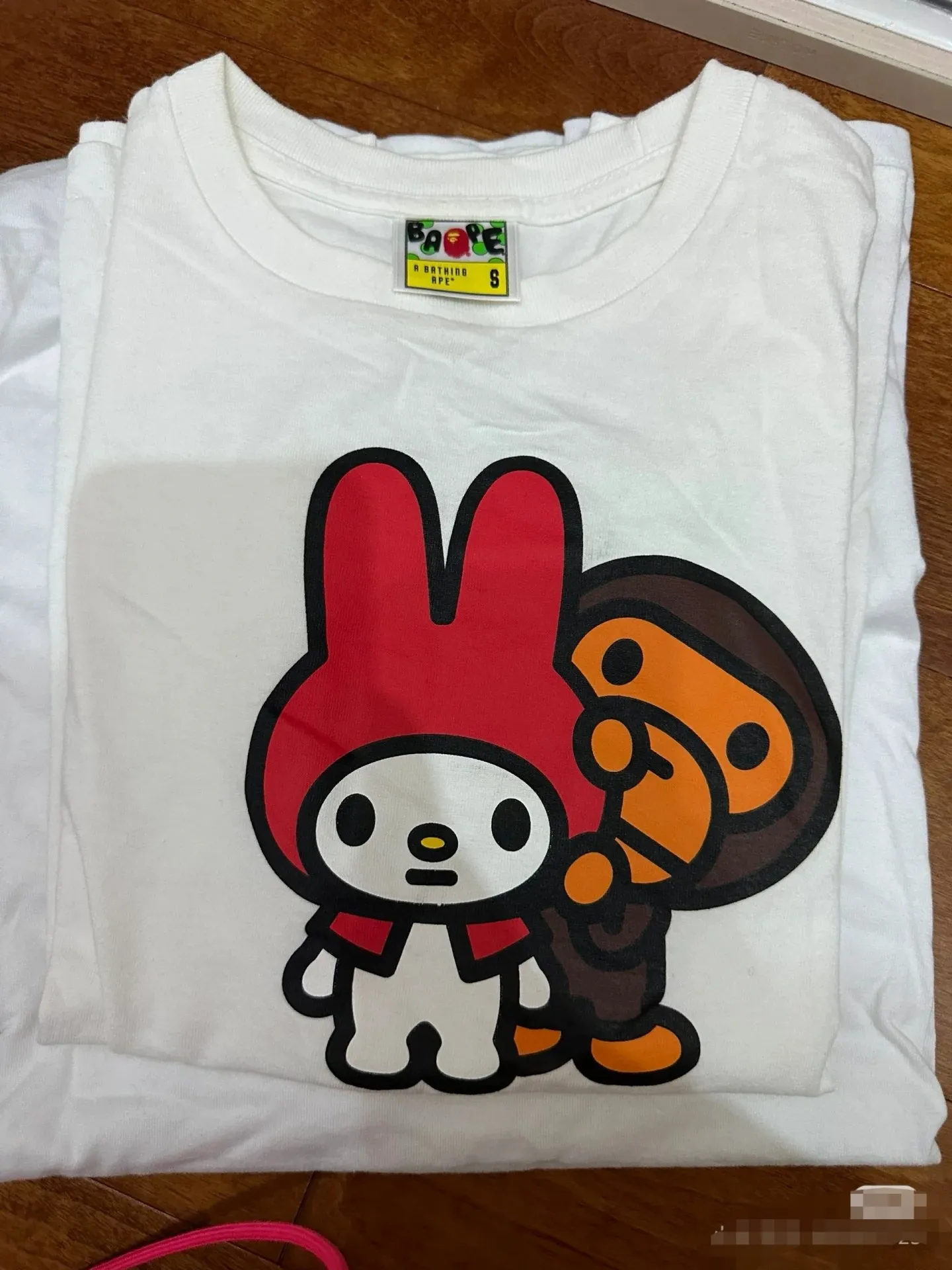 P110 001057 bapeXmelody co-branded printed short-sleeved T-shirt, same style for men and women, size smlxlxxl, white
