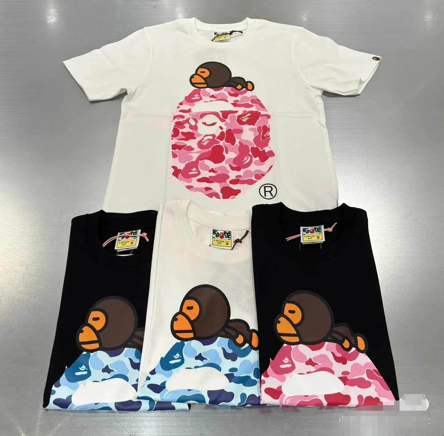 P110 00102 model BAPE SS25 ABC CAMO series ape head orangutan pattern letter print cuff logo camouflage short-sleeved T-shirt same style for men and women code number smlxlxxl white pink, black pink