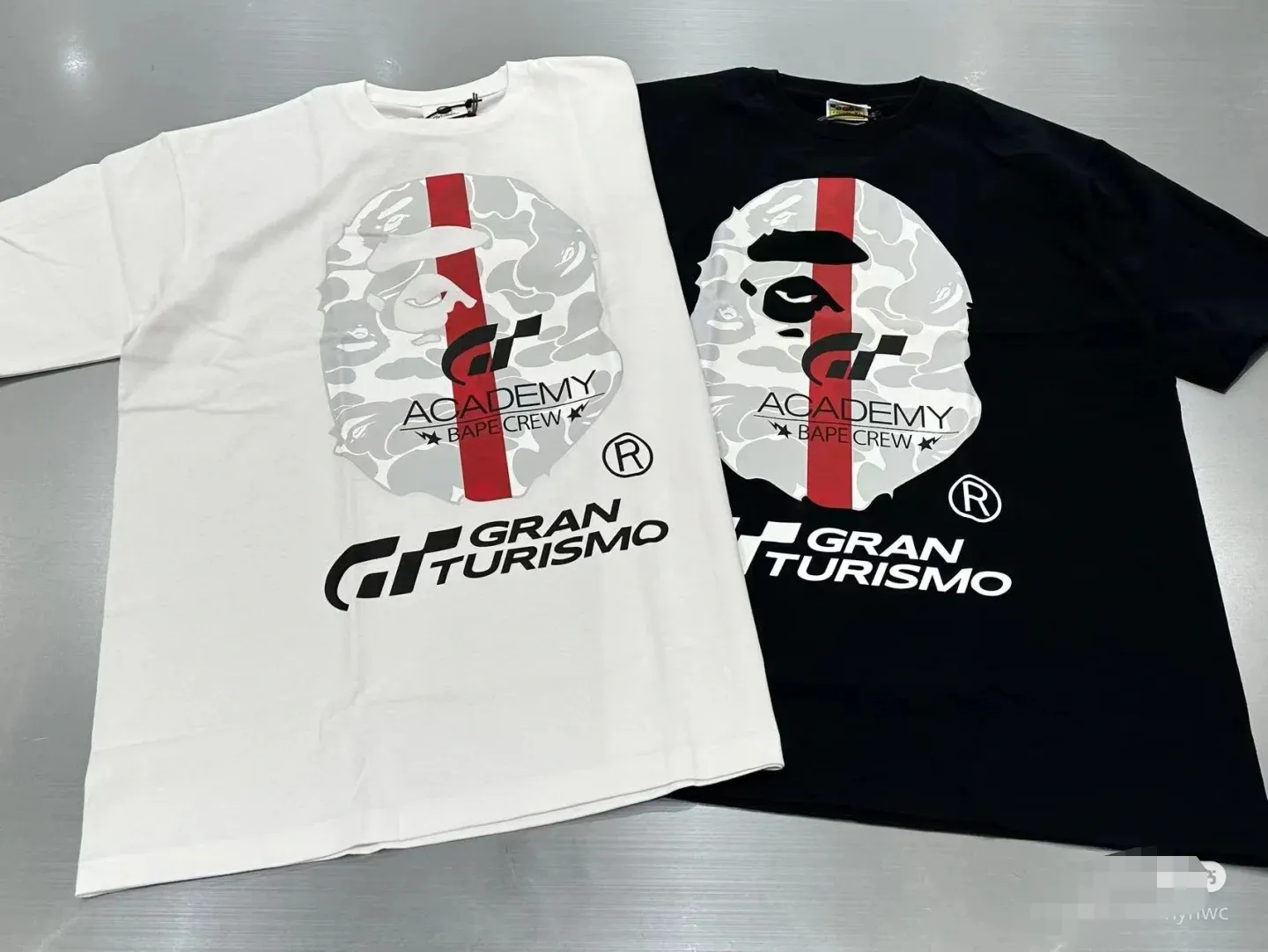P110 001147 BAPE x GRAN TURISMO joint model SS23 Ape Logo printed round neck short-sleeved T-shirt, same style for men and women, size smlxlxxl, black and white
