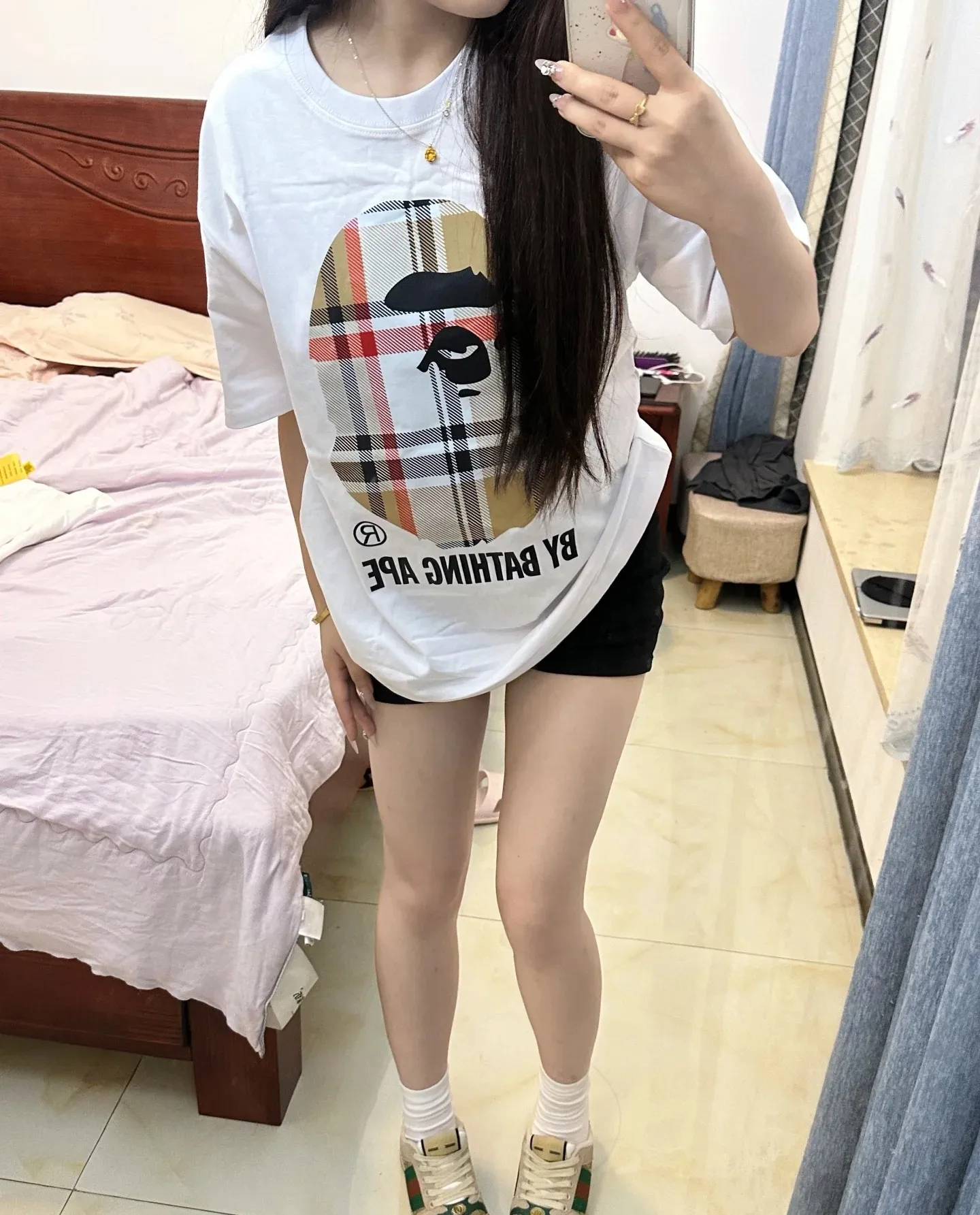 P110 001028 A BATHING APE Bape SS23 ape print round neck pullover short-sleeved T-shirt, same style for men and women, size smlxlxxl, black and white