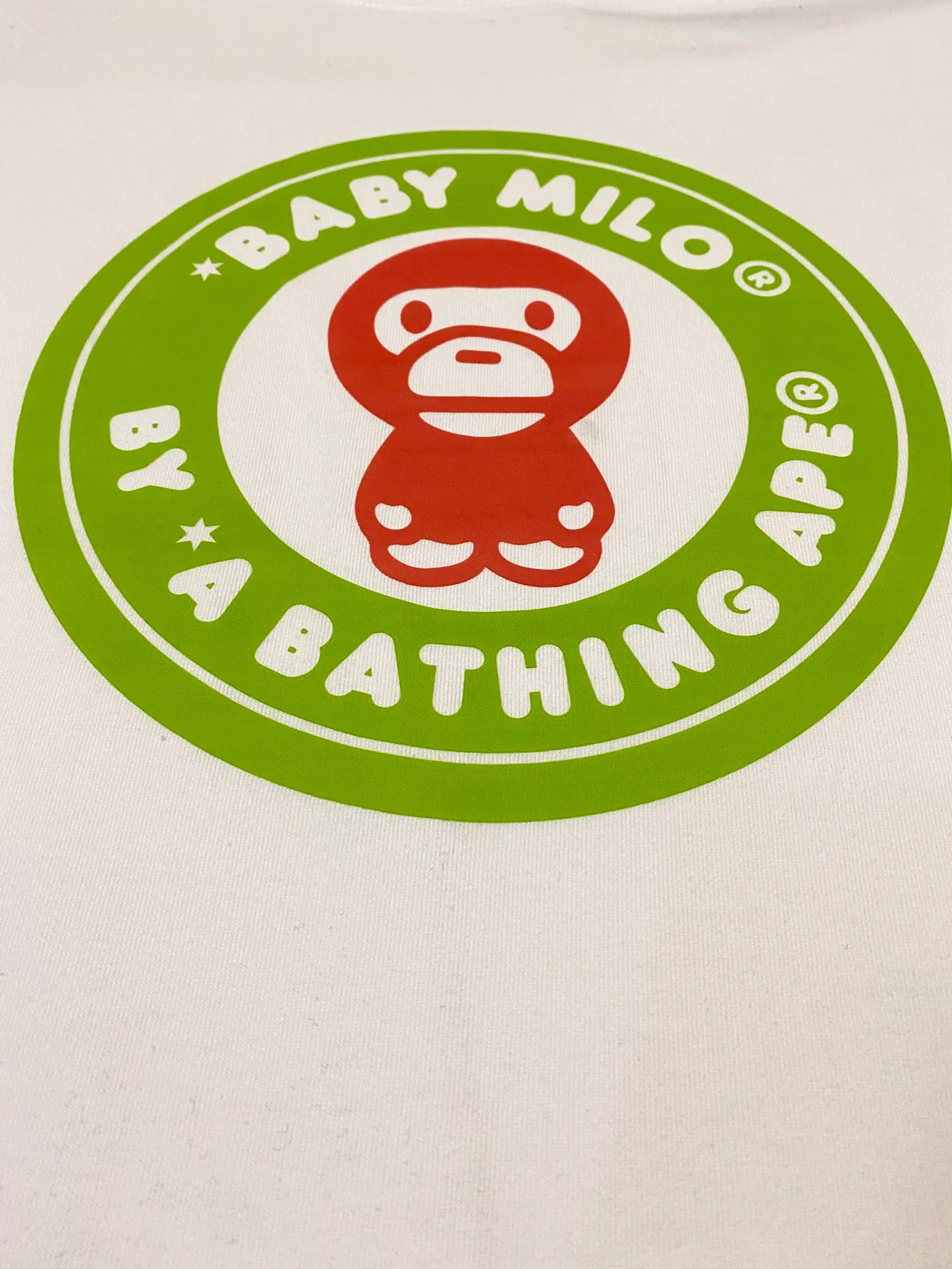 SC080#p110💰 (Top version) BAPE cartoon BABY MILO medallion letter printed short-sleeved T-shirt Made of 260 grams of high-quality high-weave pure cotton fabric, double yarn combed, soft and non-pilling texture, imported environmentally friendly printing glue, bright and three-dimensional pattern, quality 💥Same style for men and women, the upper body is fashionable Color: black and red, white and red, black and blue, white and blue Size: S M L XL XXL