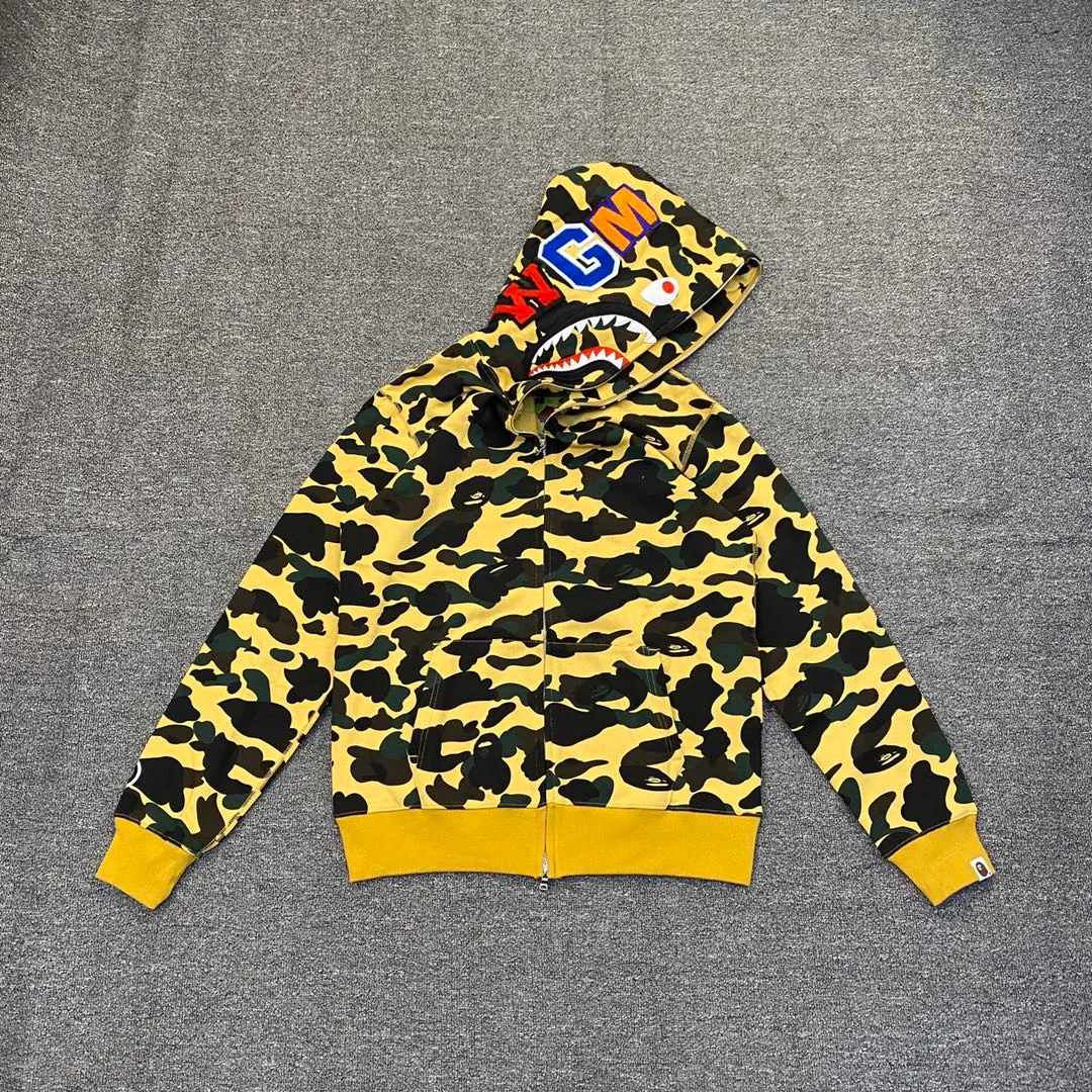💰380 BAPE 1ST CAMO SHARK FULL Classic counter model Camouflage shark hooded zipper sweatshirt Machine-printed camouflage Top-quality fabric High-end 1:1 replica Customized fabric Couple model: S—XXL [Camouflage yellow, Camouflage green, Camouflage red, Camouflage purple, Camouflage blue, Camouflage gray]