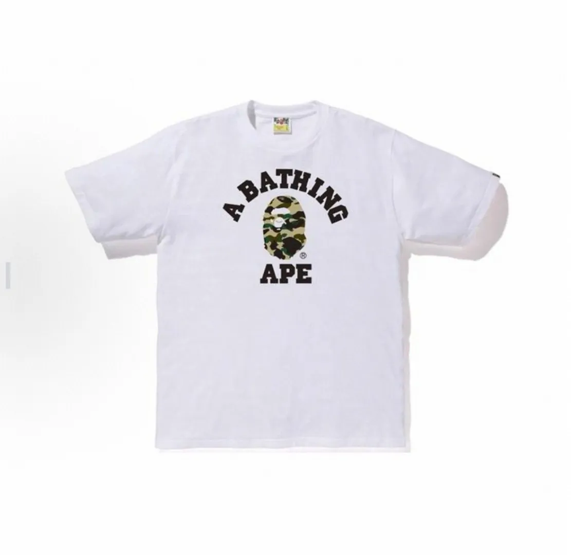P110 00117 A BATHING APE BAPE SS23 camouflage ape head letter print casual short-sleeved T-shirt, same style for men and women, size smlxlxxl, black and green camouflage, black and yellow camouflage, white and green camouflage, white and yellow camouflage