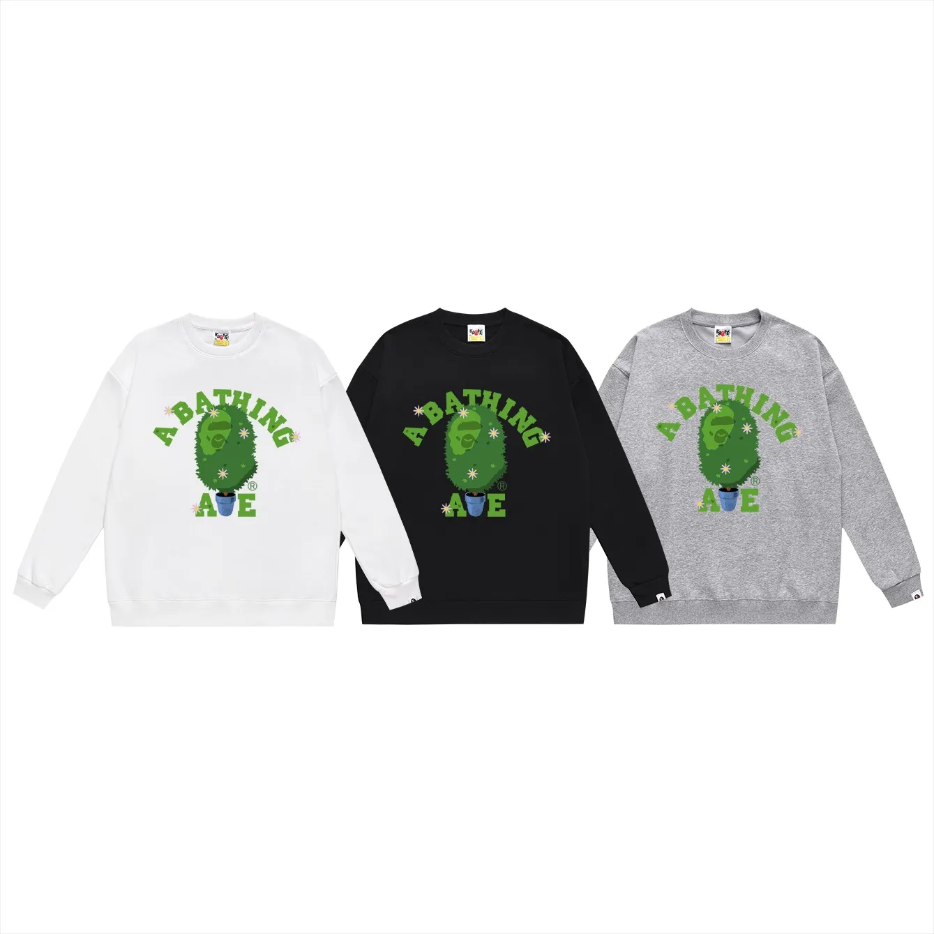P150 model number SC483# terry 75 plus velvet 80 (top version) BAPE potted flower limited edition printed round neck sweatshirt. Made of 350g large terry (drop shoulder large version) fabric. The texture is soft and non-pilling. Imported environmentally friendly printing glue. The pattern is bright and three-dimensional. Quality 💥Same style for men and women. The upper body is trendy. Color: black white gray Size: S M L XL XXL