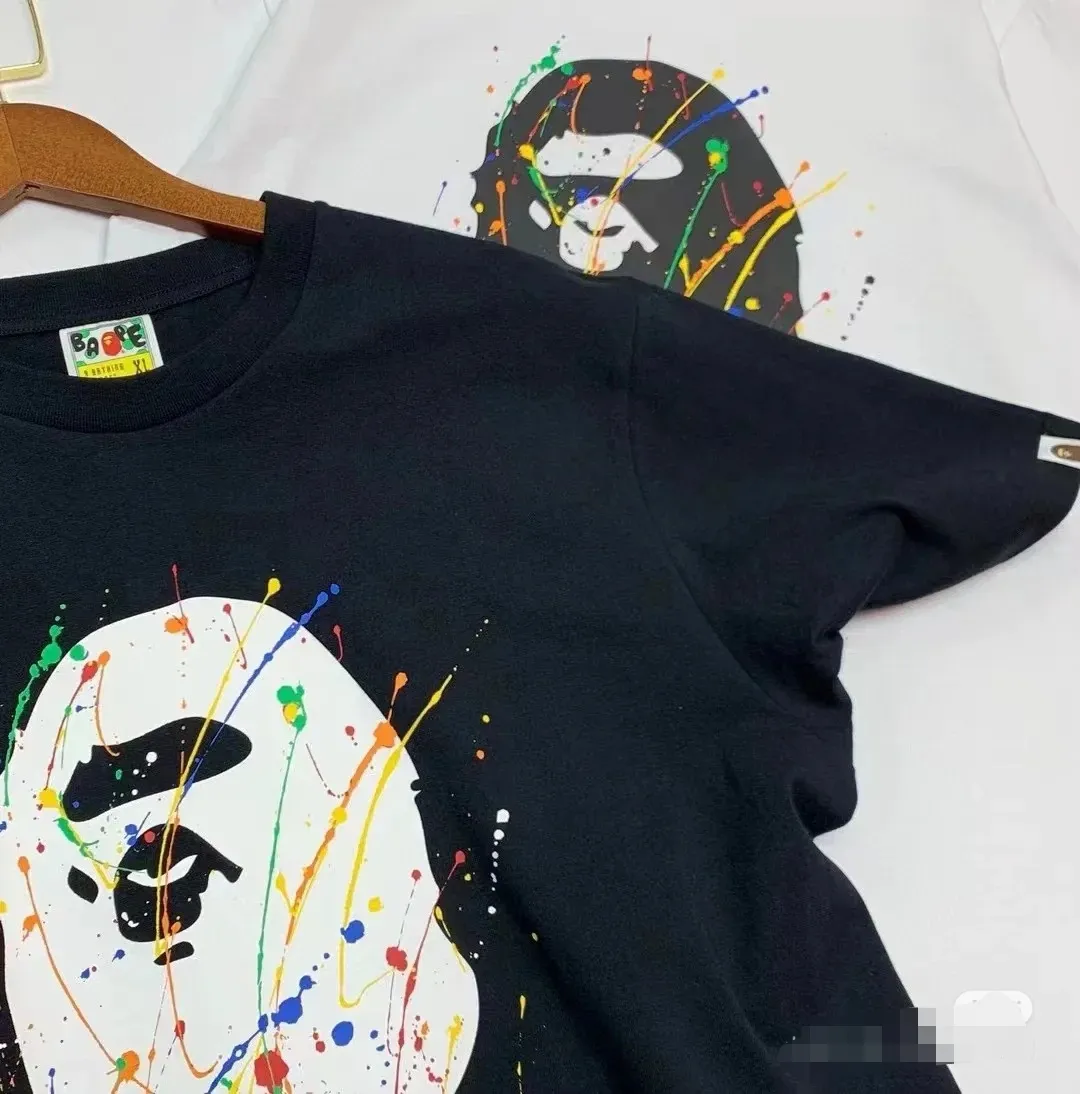 P110 001088 BAPE Paint Splatter Ape Head Oversized Tee paint splash graffiti ape print round neck pullover loose short-sleeved T-shirt same style for men and women code number smlxlxxl black white